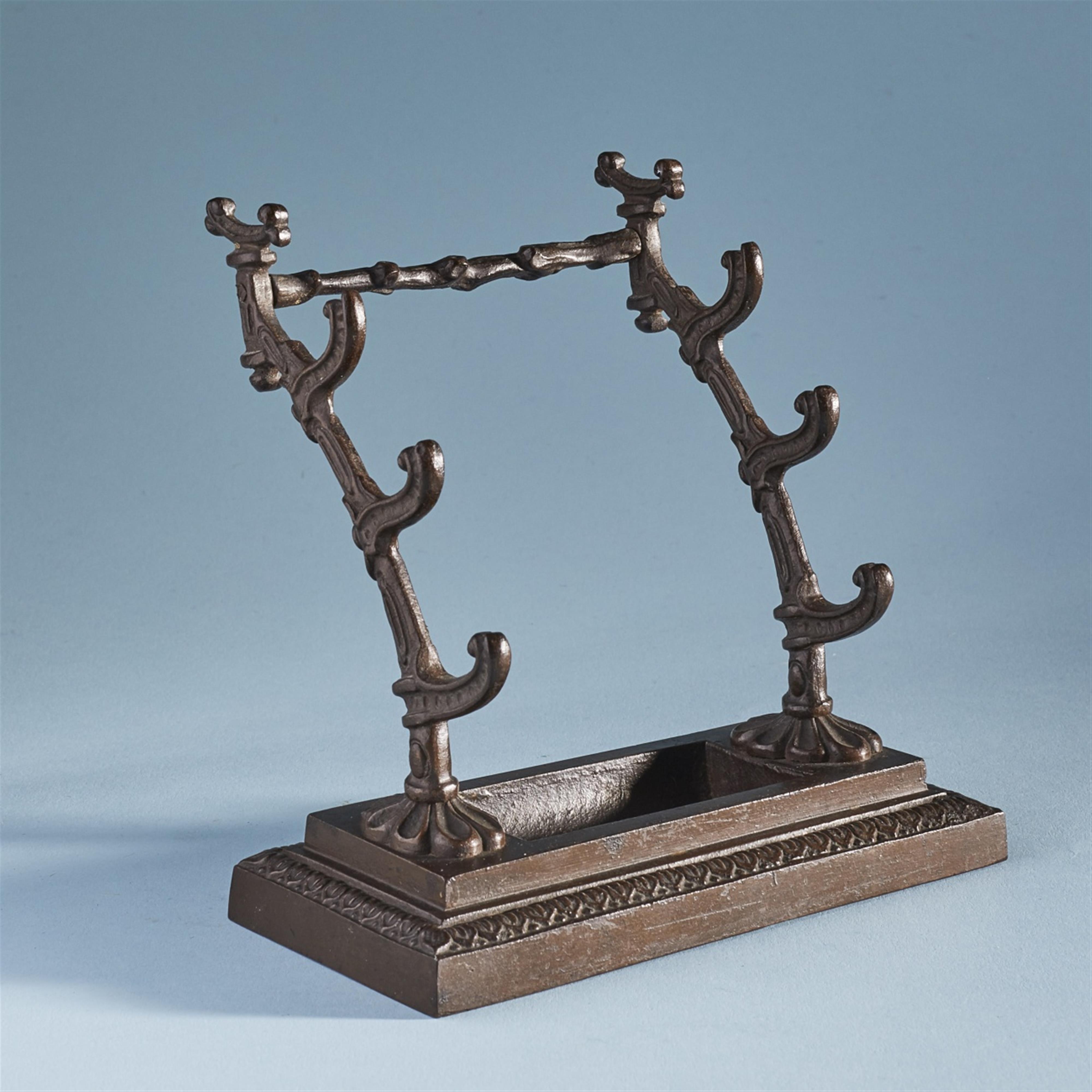 A cast iron quill stand - image-1