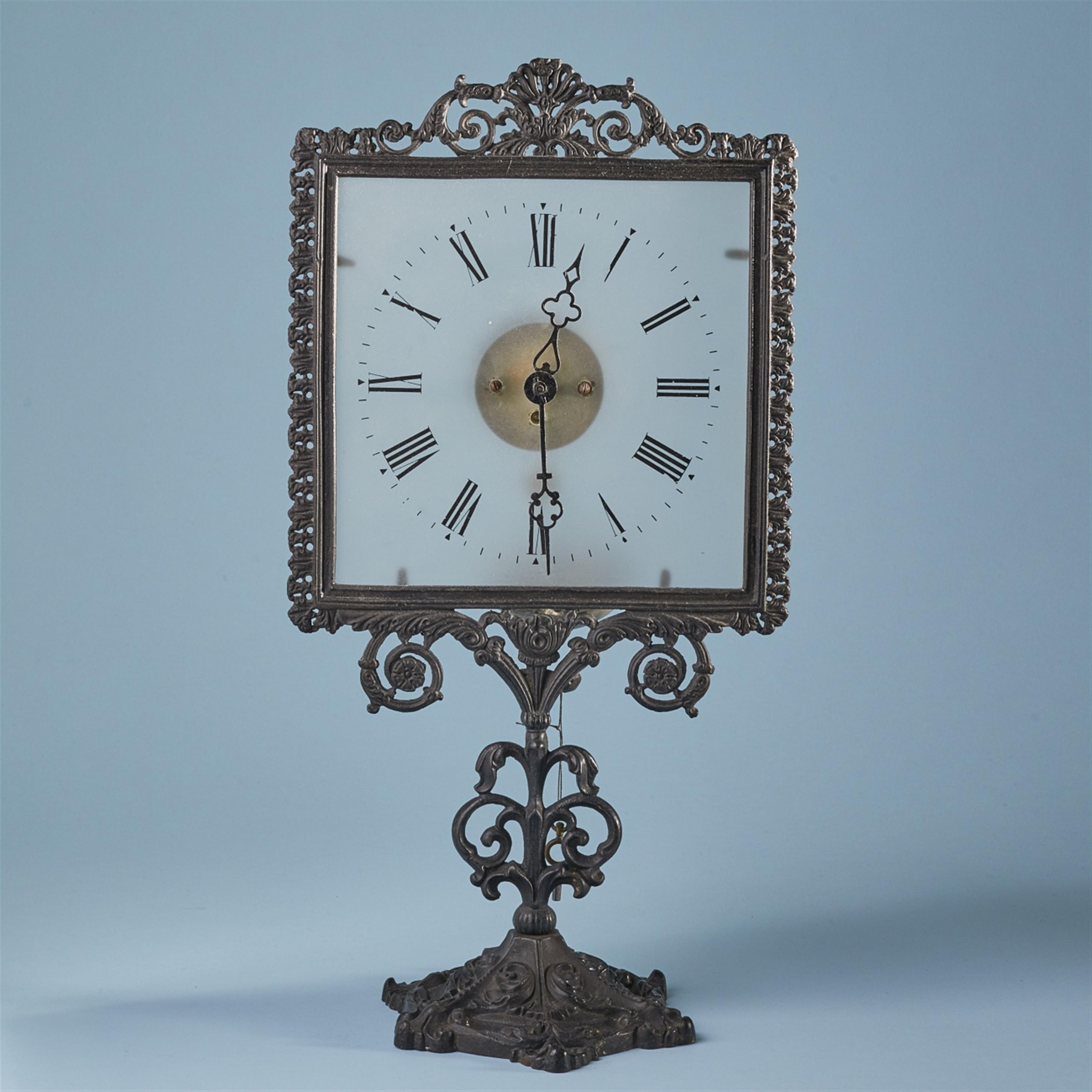 A rare cast iron night-light clock - image-1