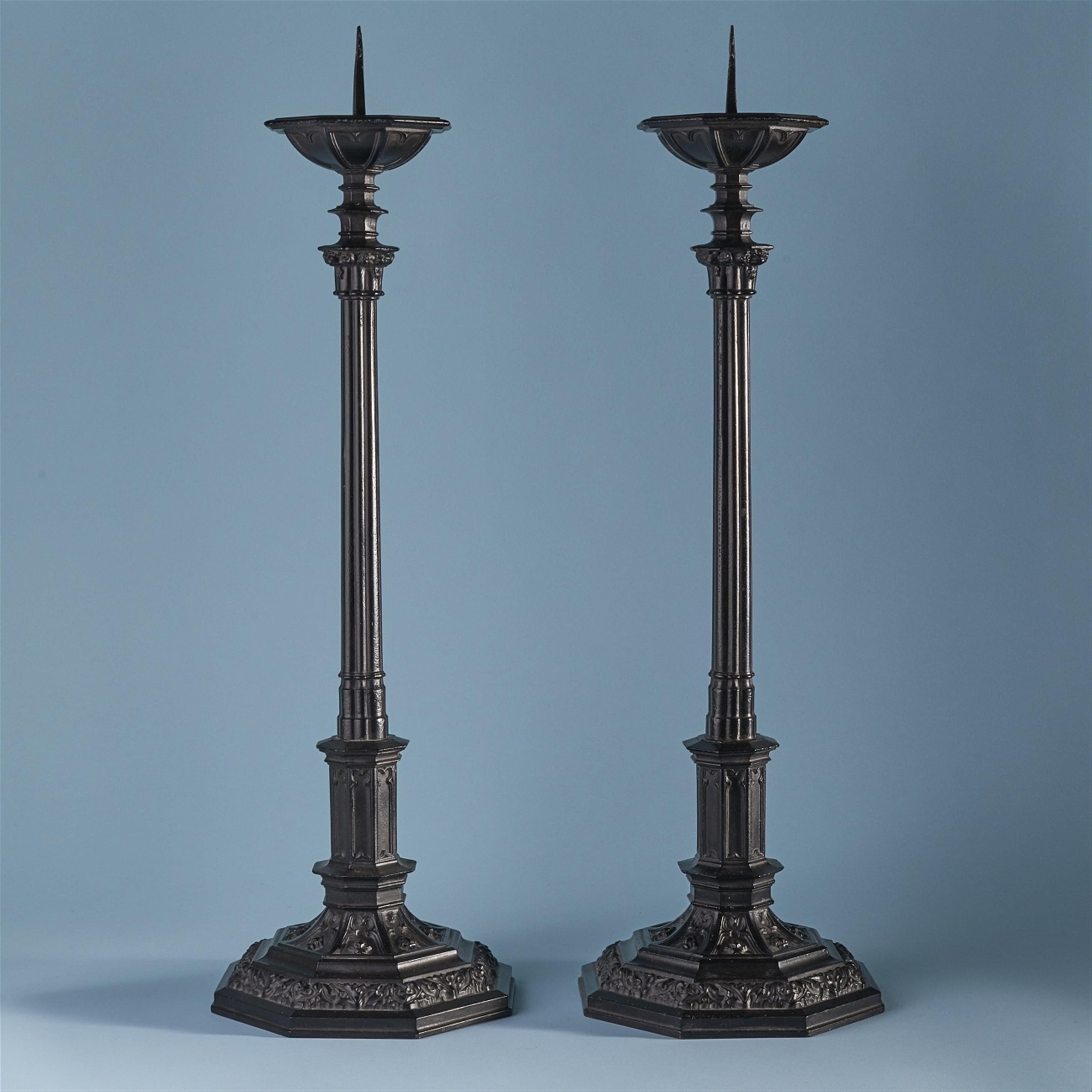 A pair of Gothic Revival cast iron candlesticks - image-1