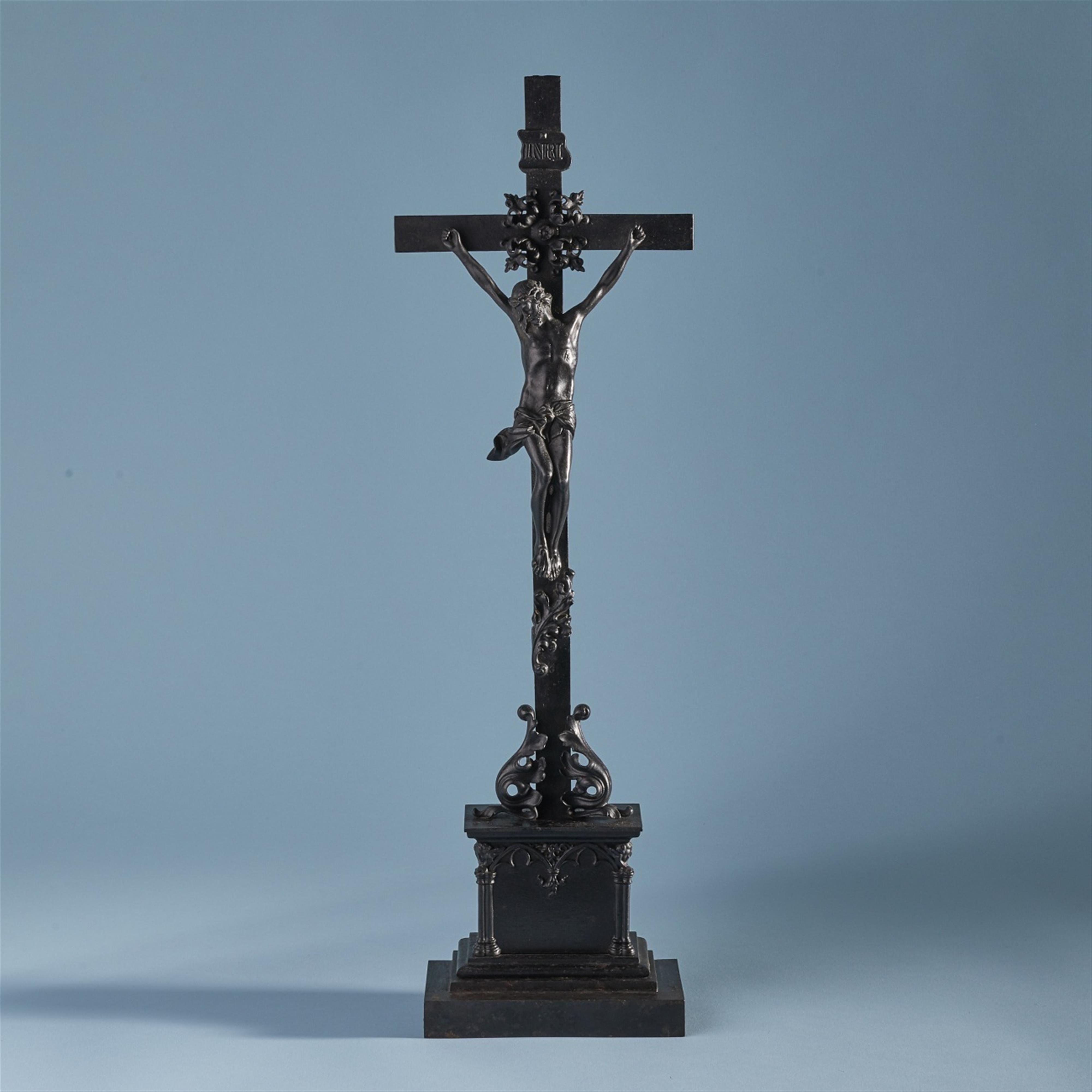 A cast iron crucifix - image-1