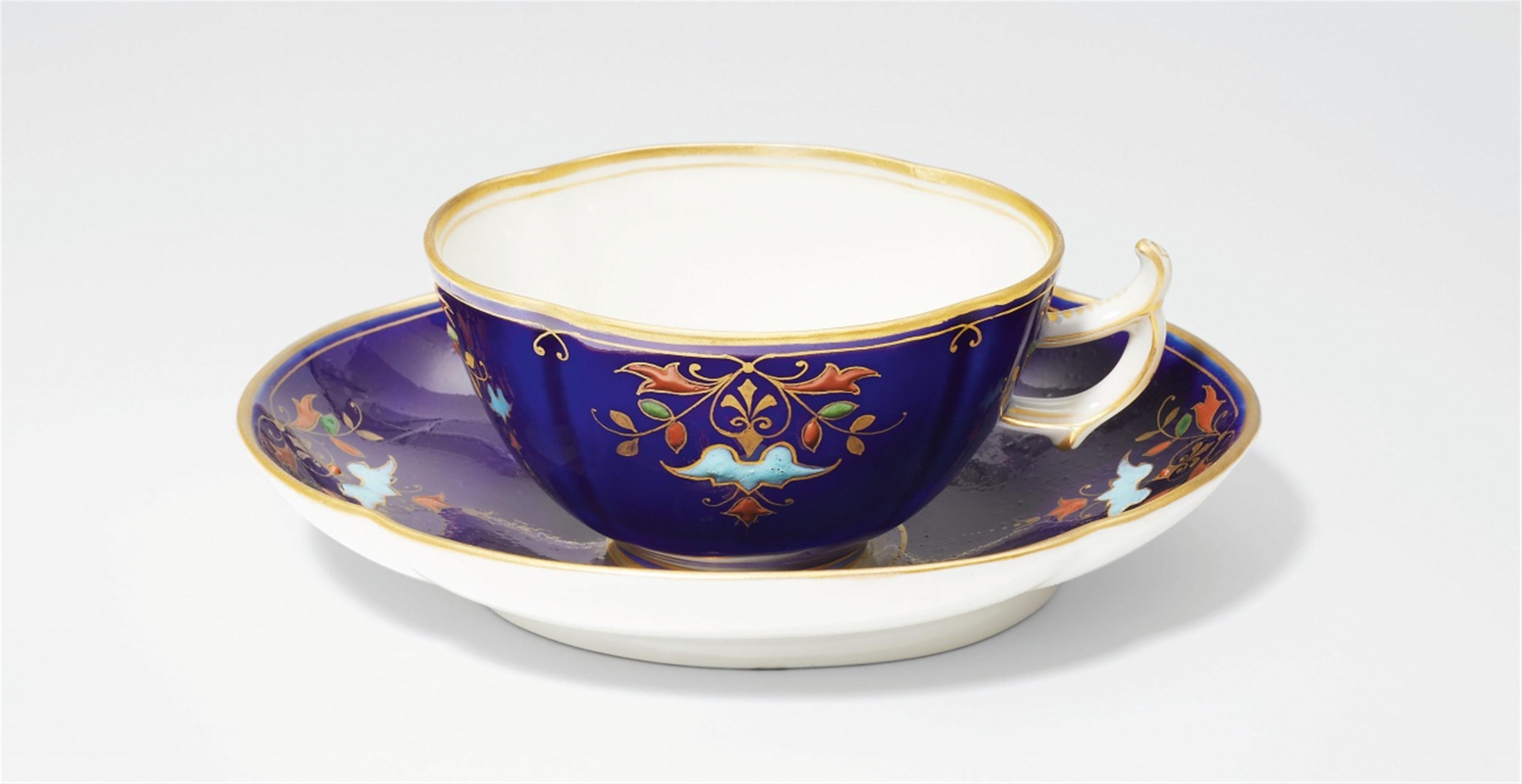 A Berlin KPM porcelain cup and saucer after a Meissen design - image-1