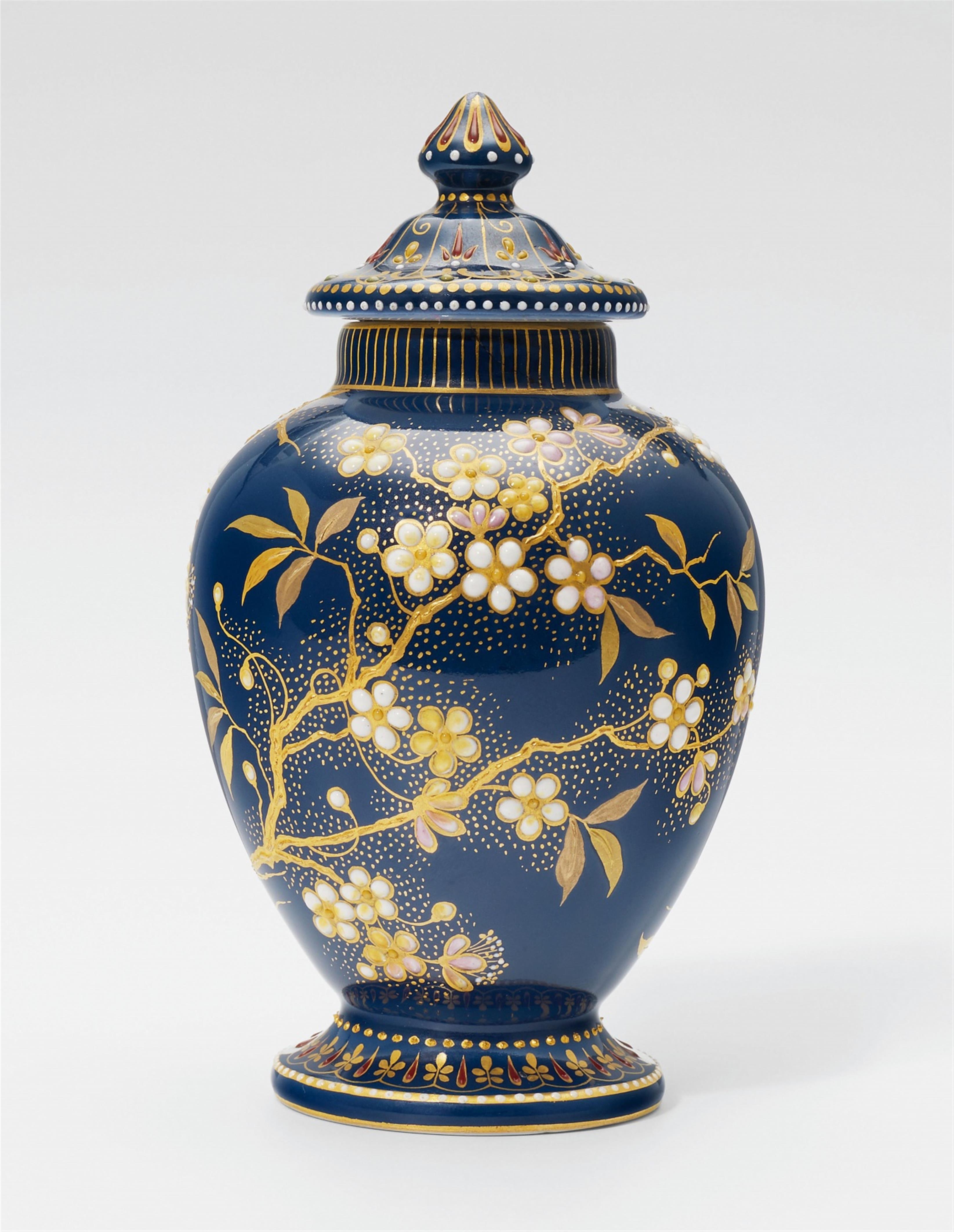 A small Berlin KPM porcelain vase with cherry blossom reliefs - image-1