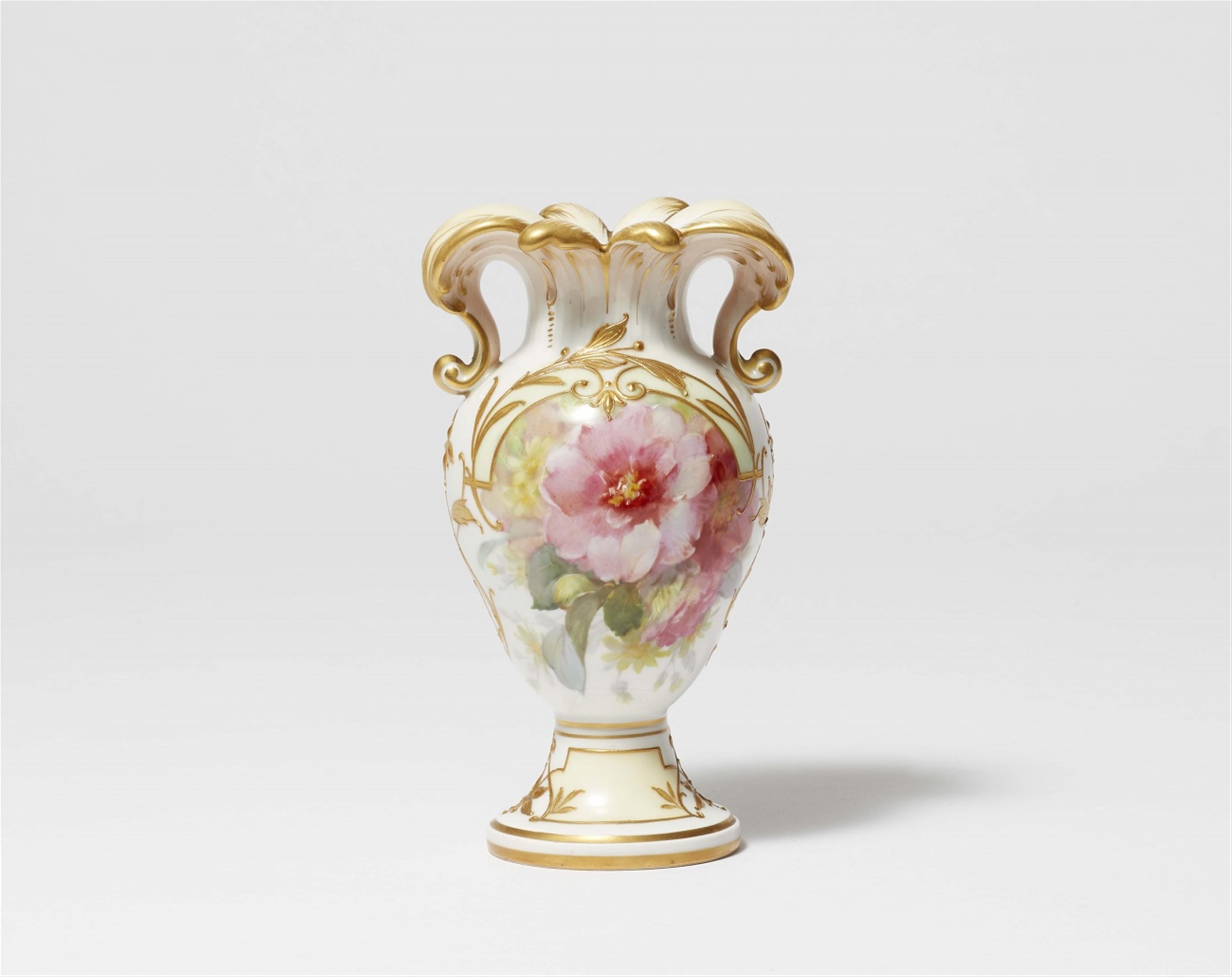 A small Berlin KPM porcelain vase with floral decoration - image-1