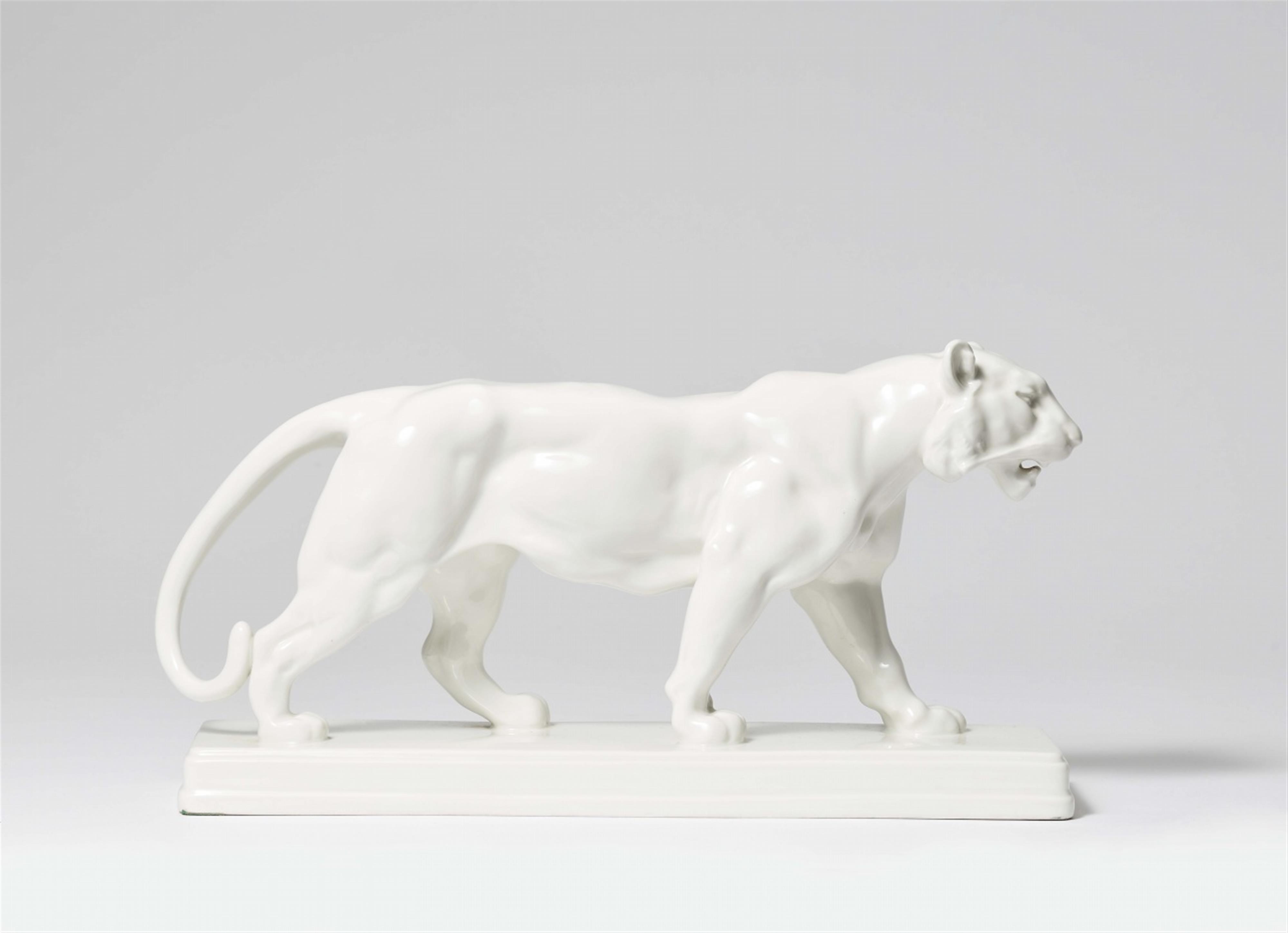 A Berlin KPM porcelain model of a tiger - image-1
