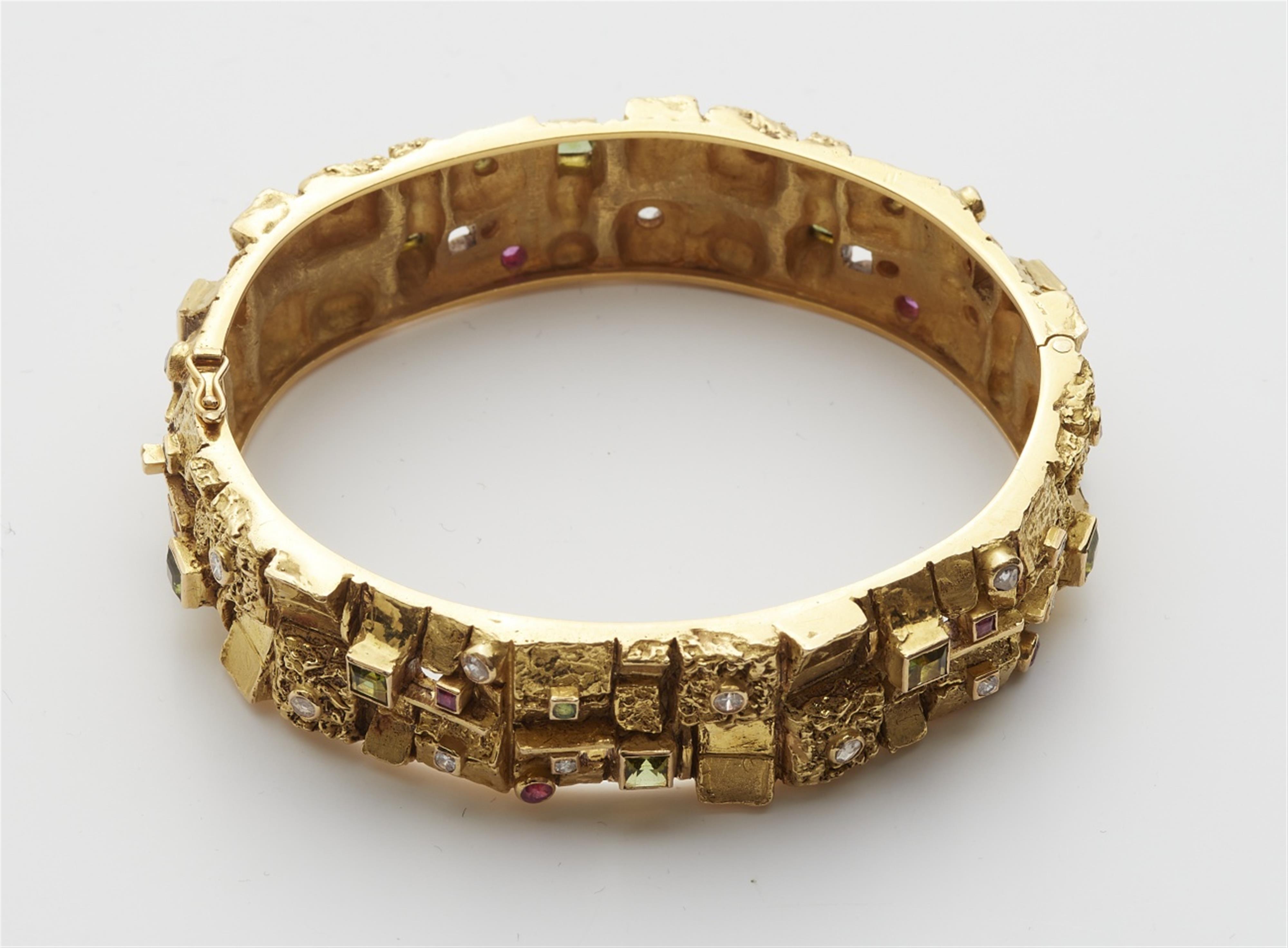 An 18k gold gemstone bangle - image-3