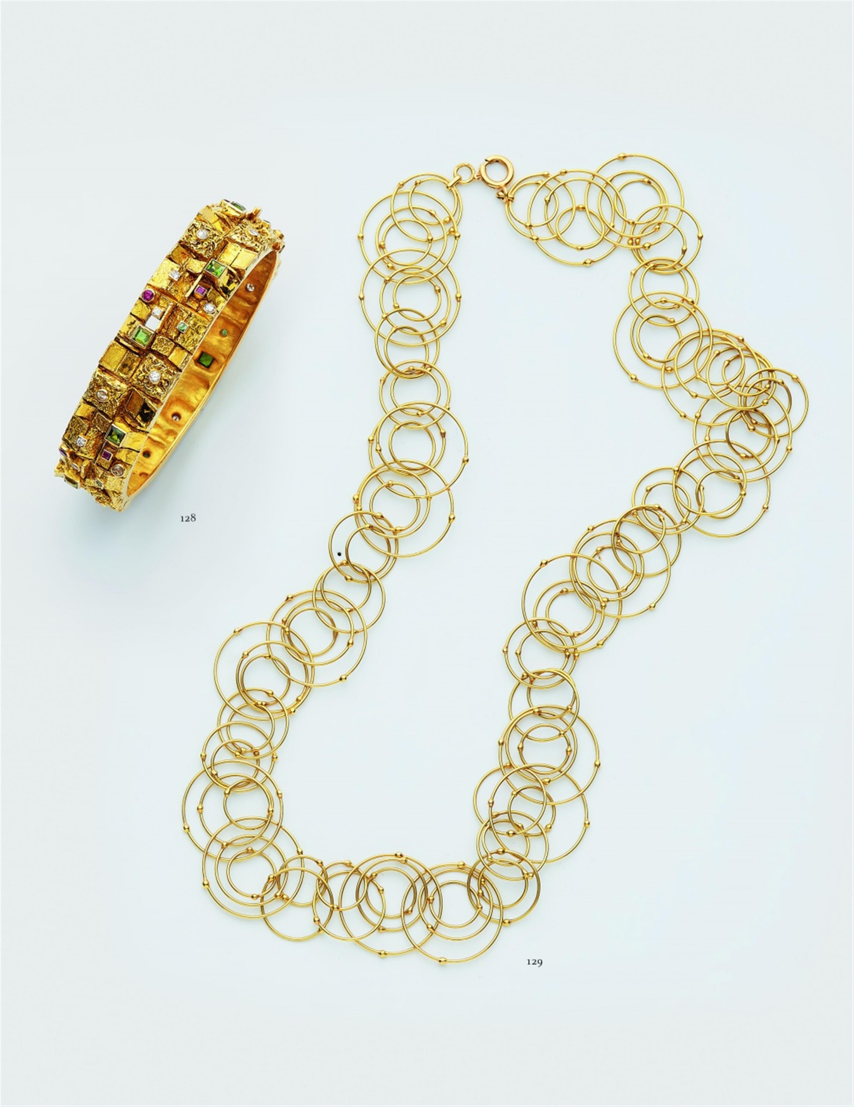 An 18k gold gemstone bangle - image-5