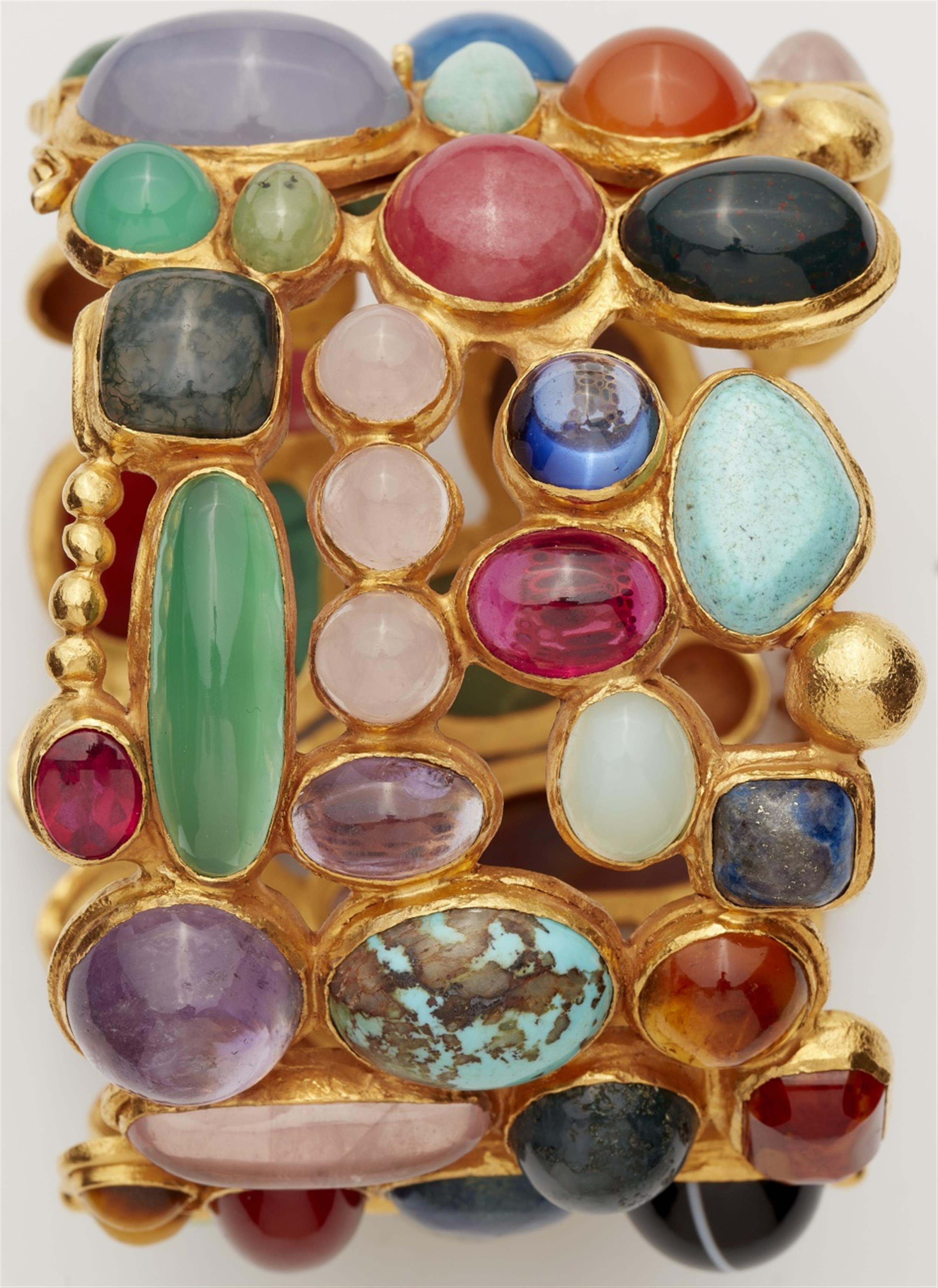 An 18k gold gemstone cuff bangle - image-4