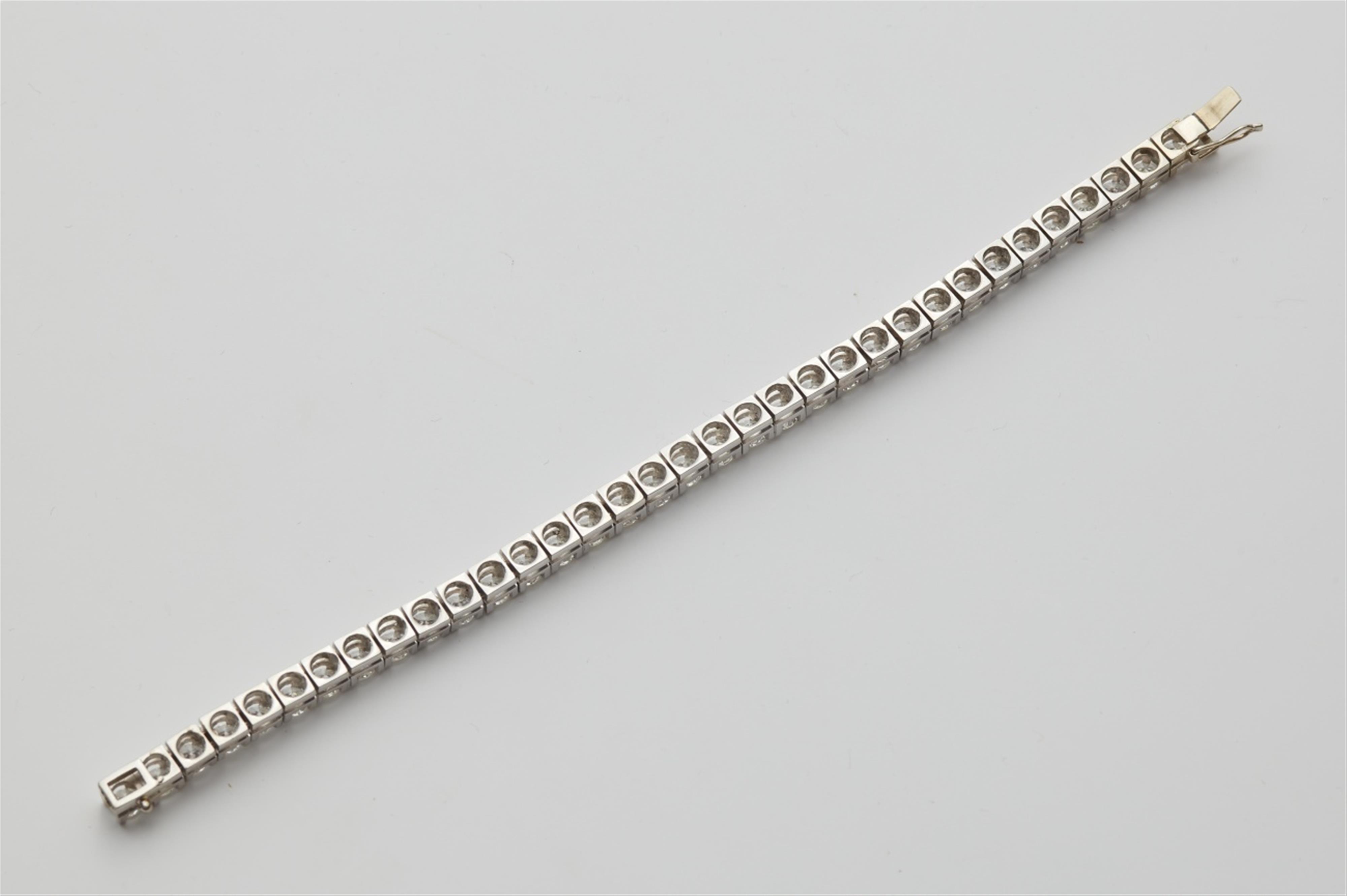 An 18k white gold diamond rivière bracelet - image-2