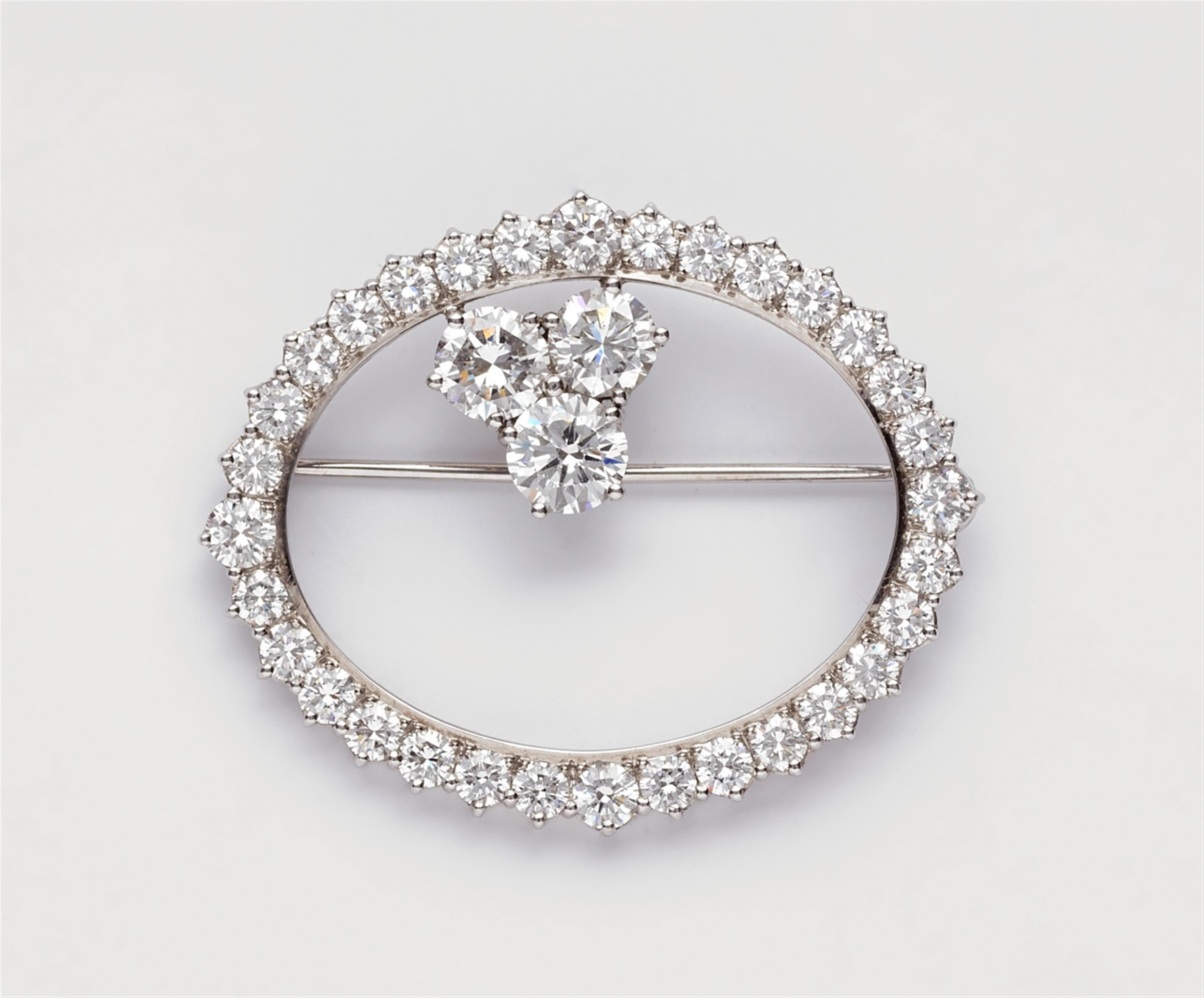 An 18k white gold and diamond brooch - image-1
