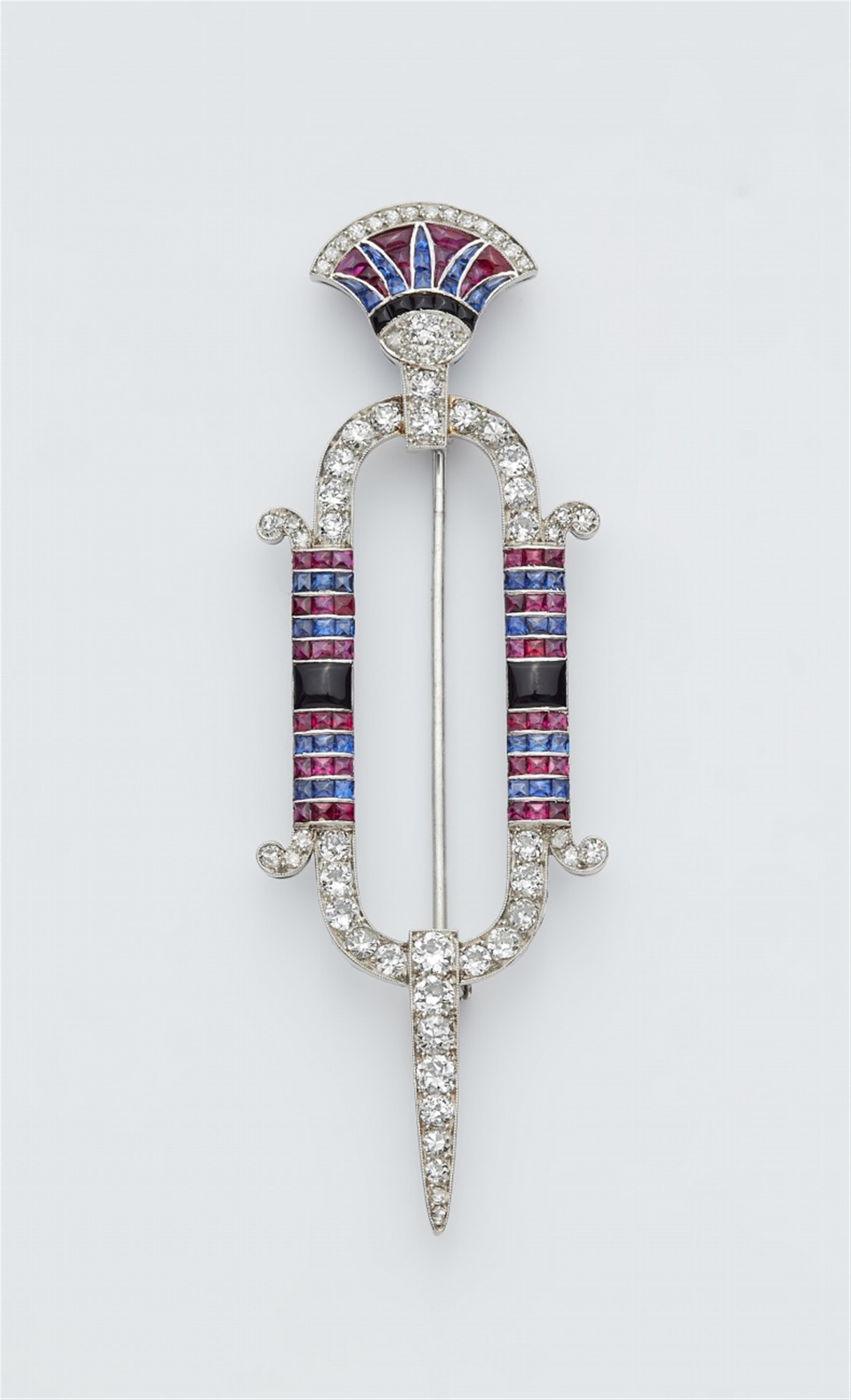 A platinum Art Deco Egyptian style brooch - image-1