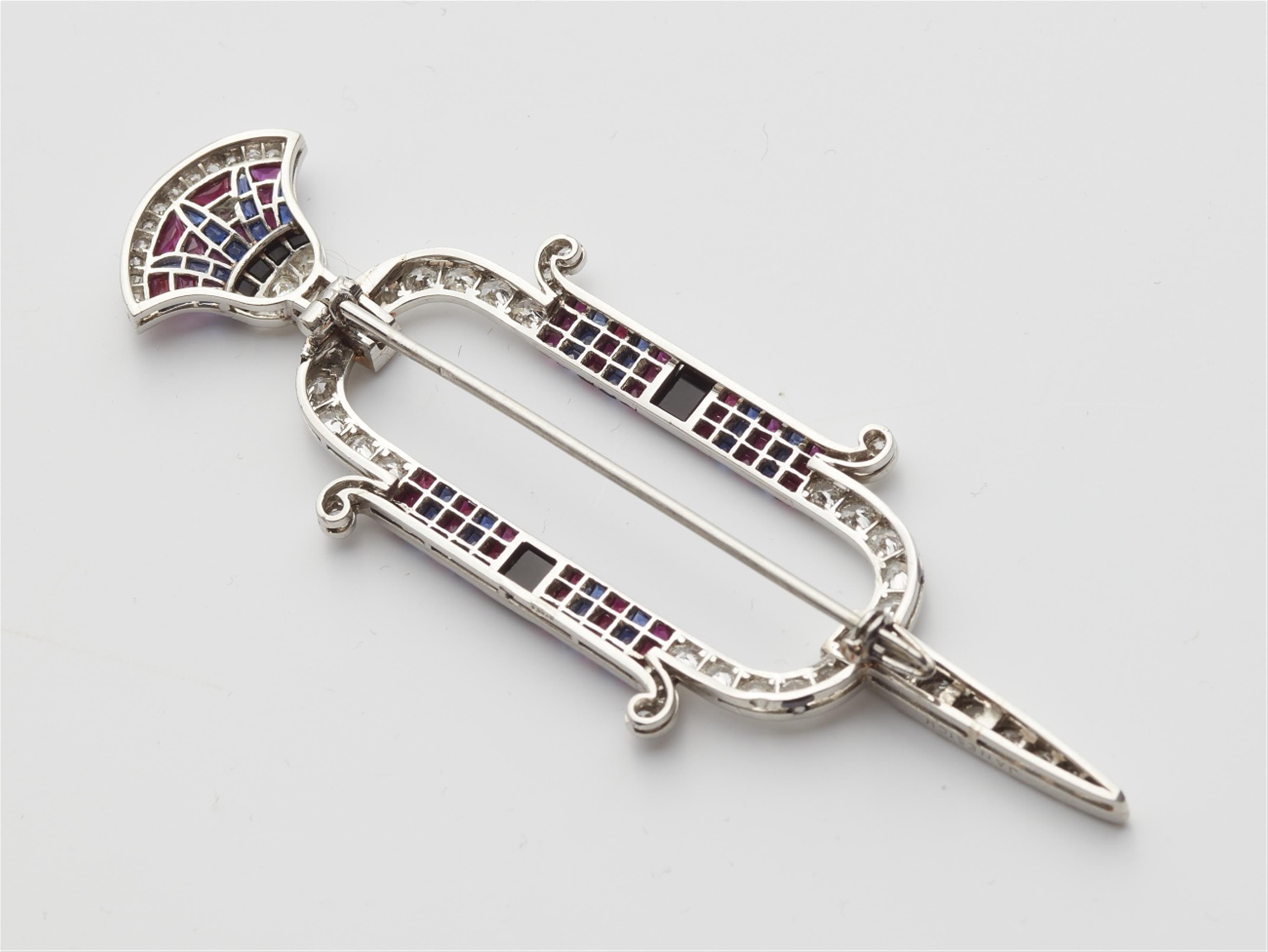 A platinum Art Deco Egyptian style brooch - image-3