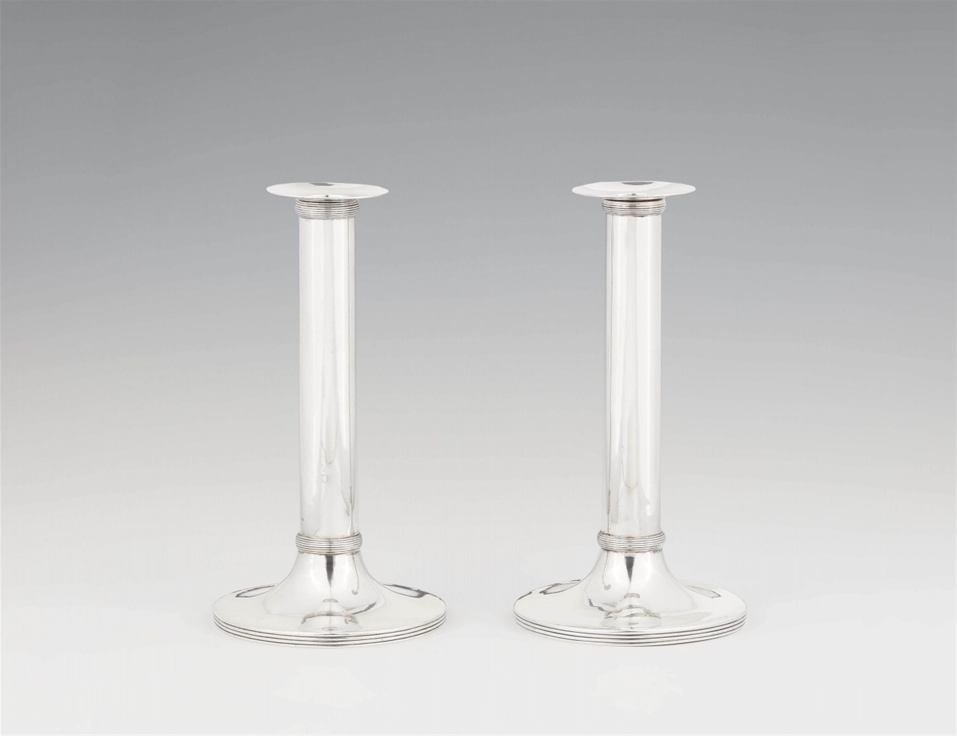 A pair of Neoclassical silver candlesticks - image-1