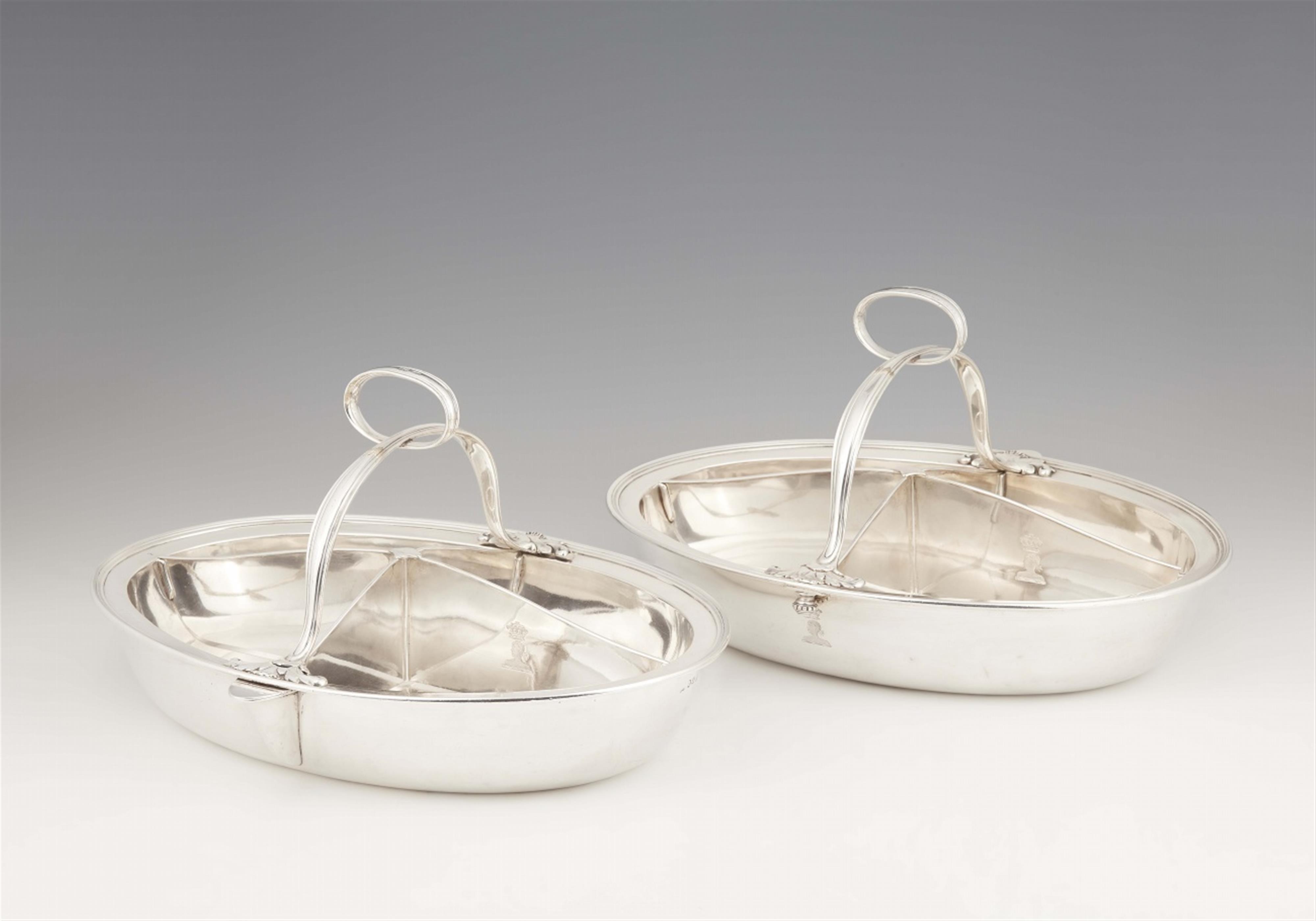 A pair of George IV silver warming dishes - image-1