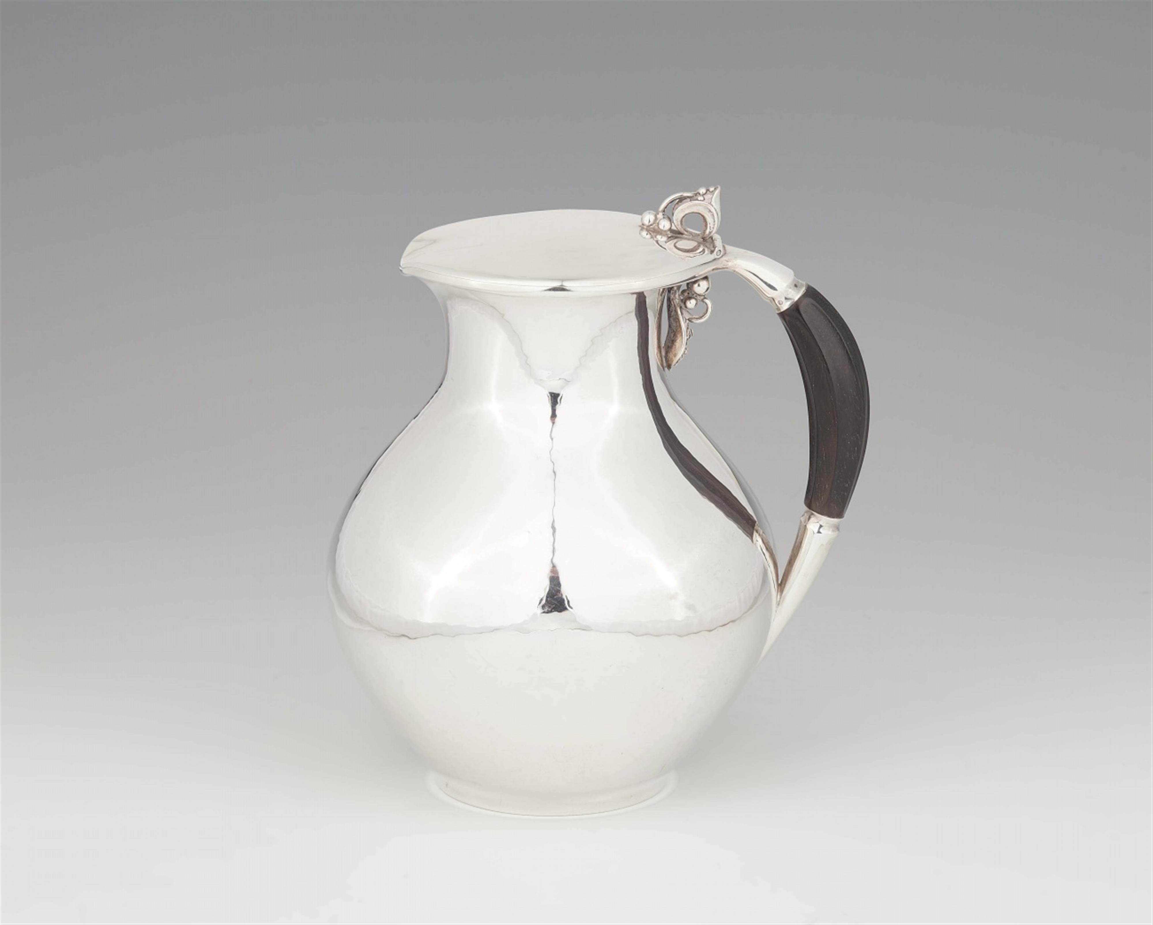 A Copenhagen silver pitcher by Georg Jensen, model no. 385 - image-1