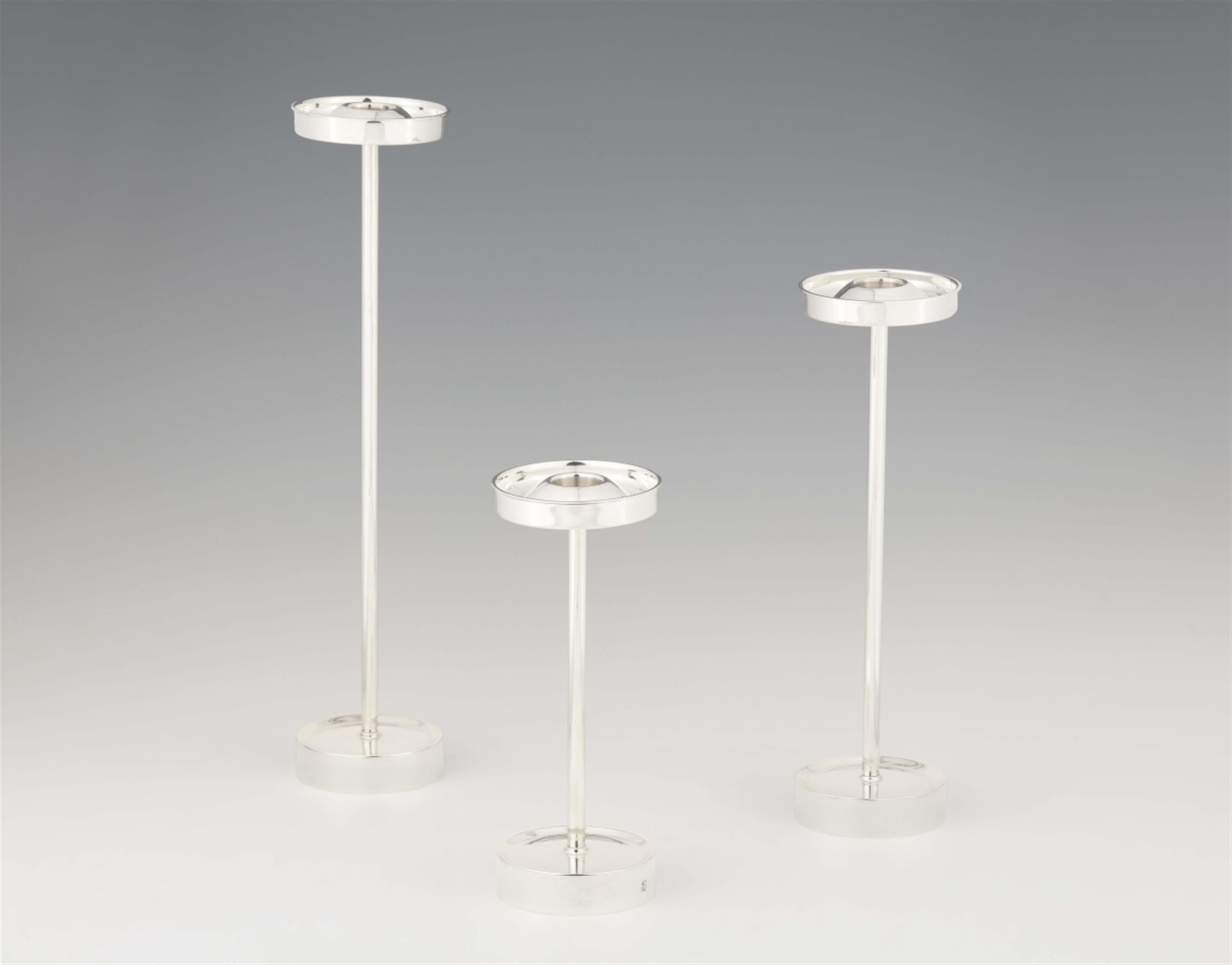 Three mid-century silver candlesticks - image-1