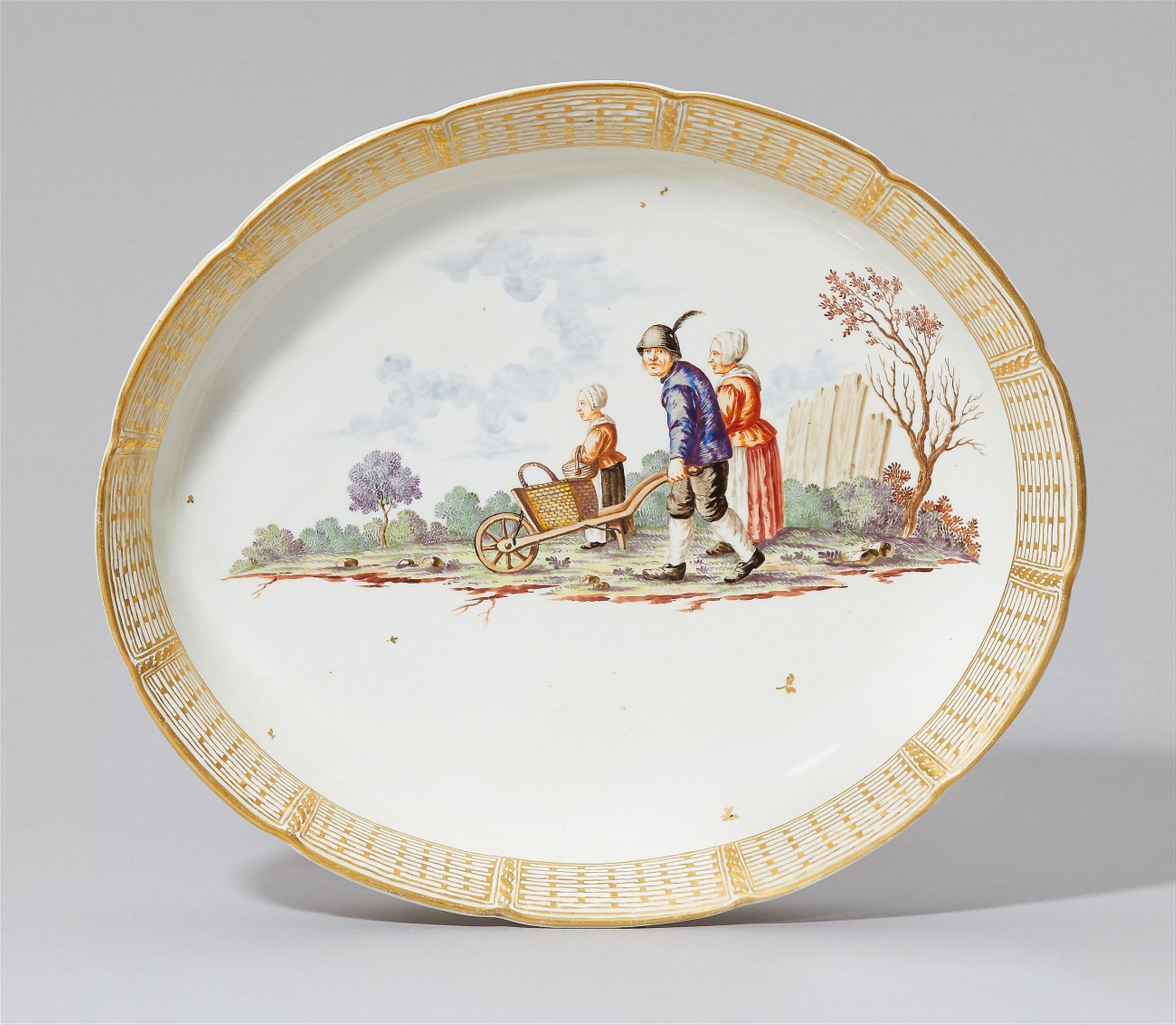 An oval Nymphenburg porcelain dish with a peasant scene - image-1