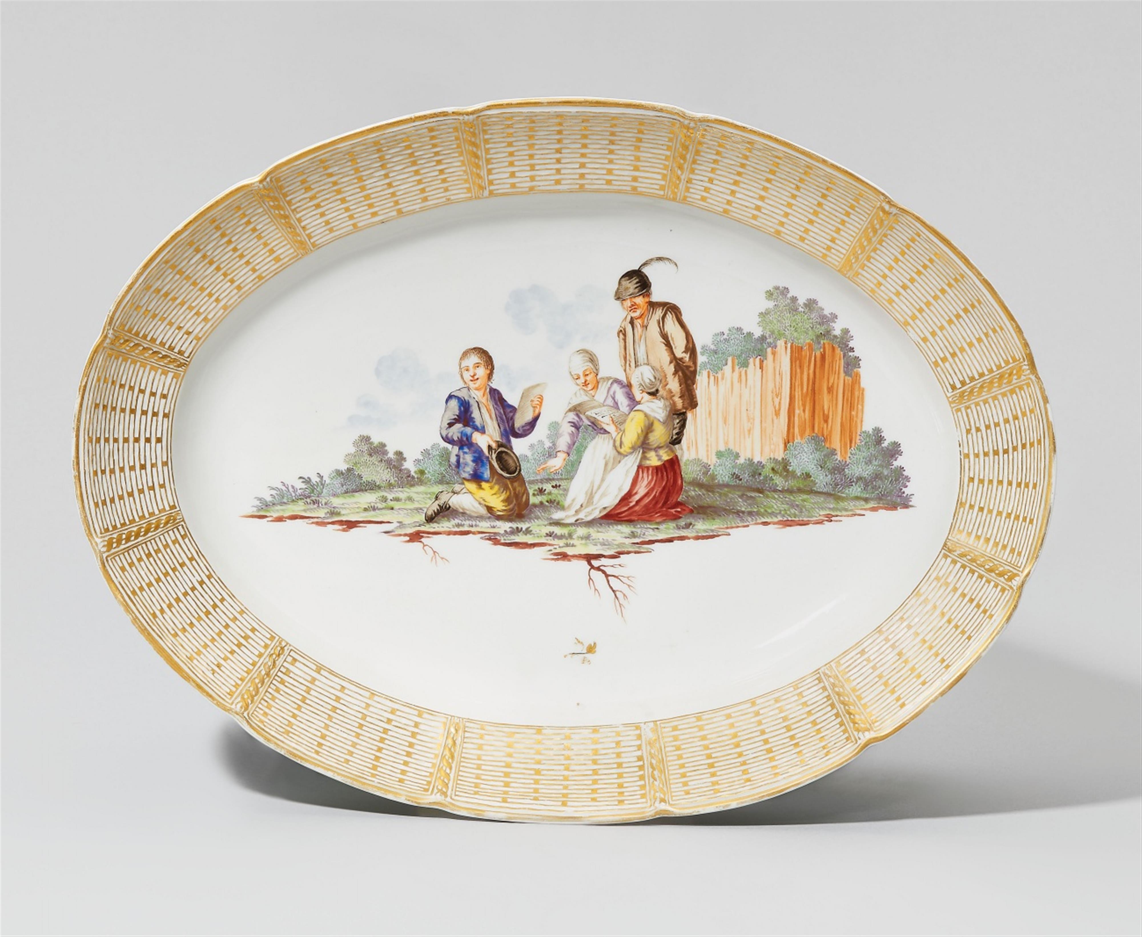 An oval Nymphenburg porcelain platter with a peasant scene - image-1