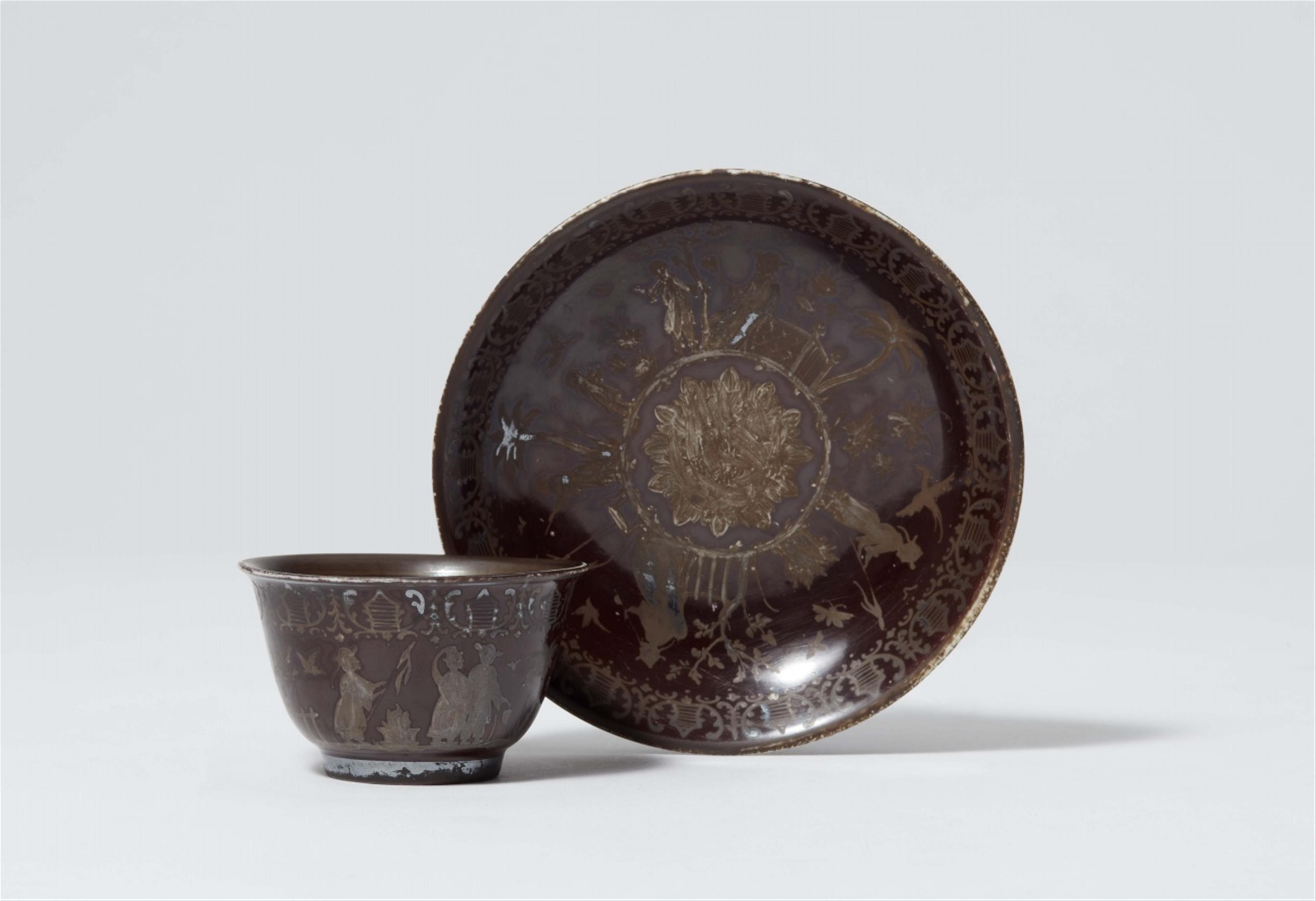 A Meissen porcelain tea bowl and saucer with rare “hausmaler” decoration - image-1