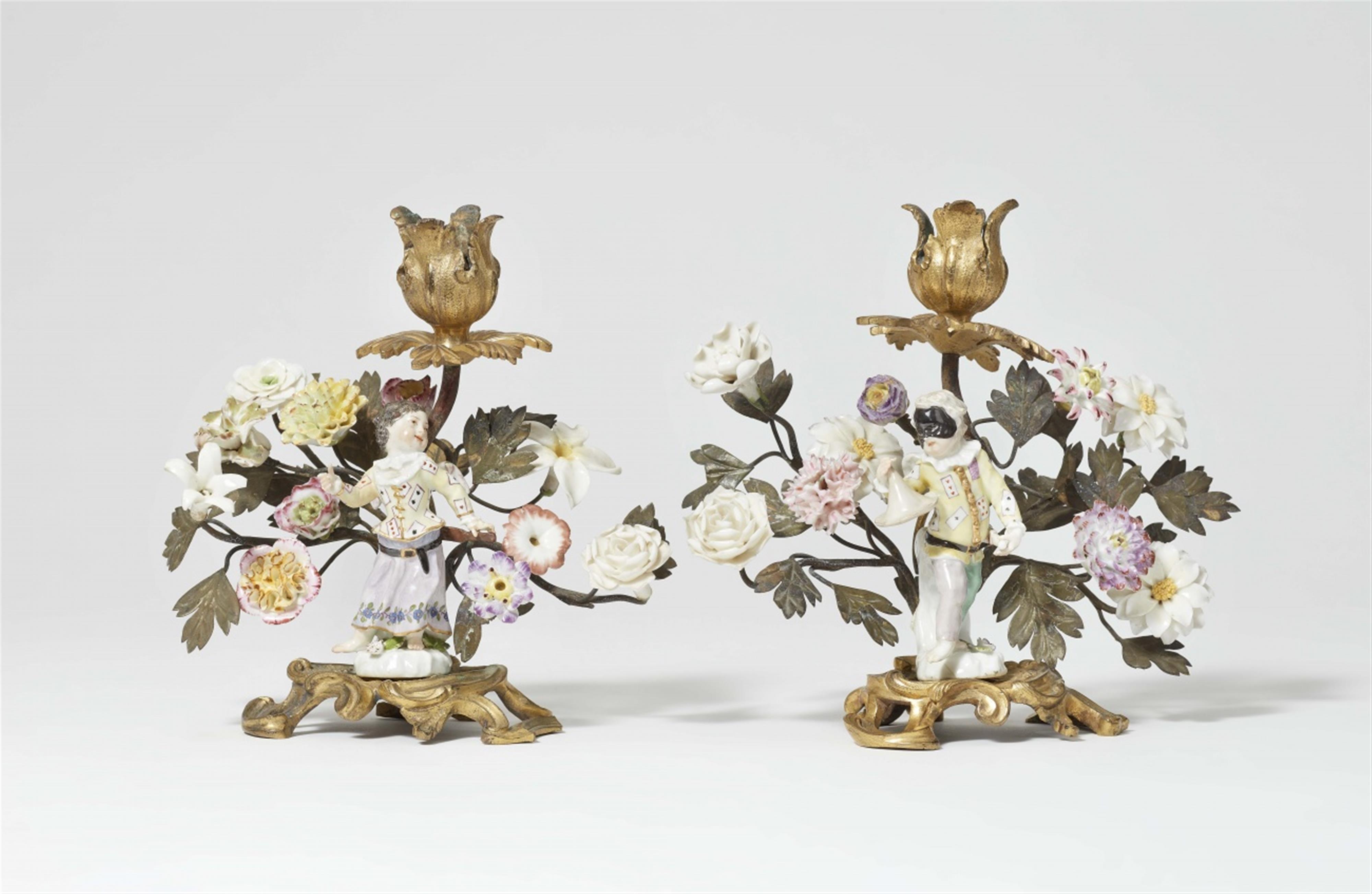 A pair of gilt bronze candlesticks with Meissen porcelain figures - image-1