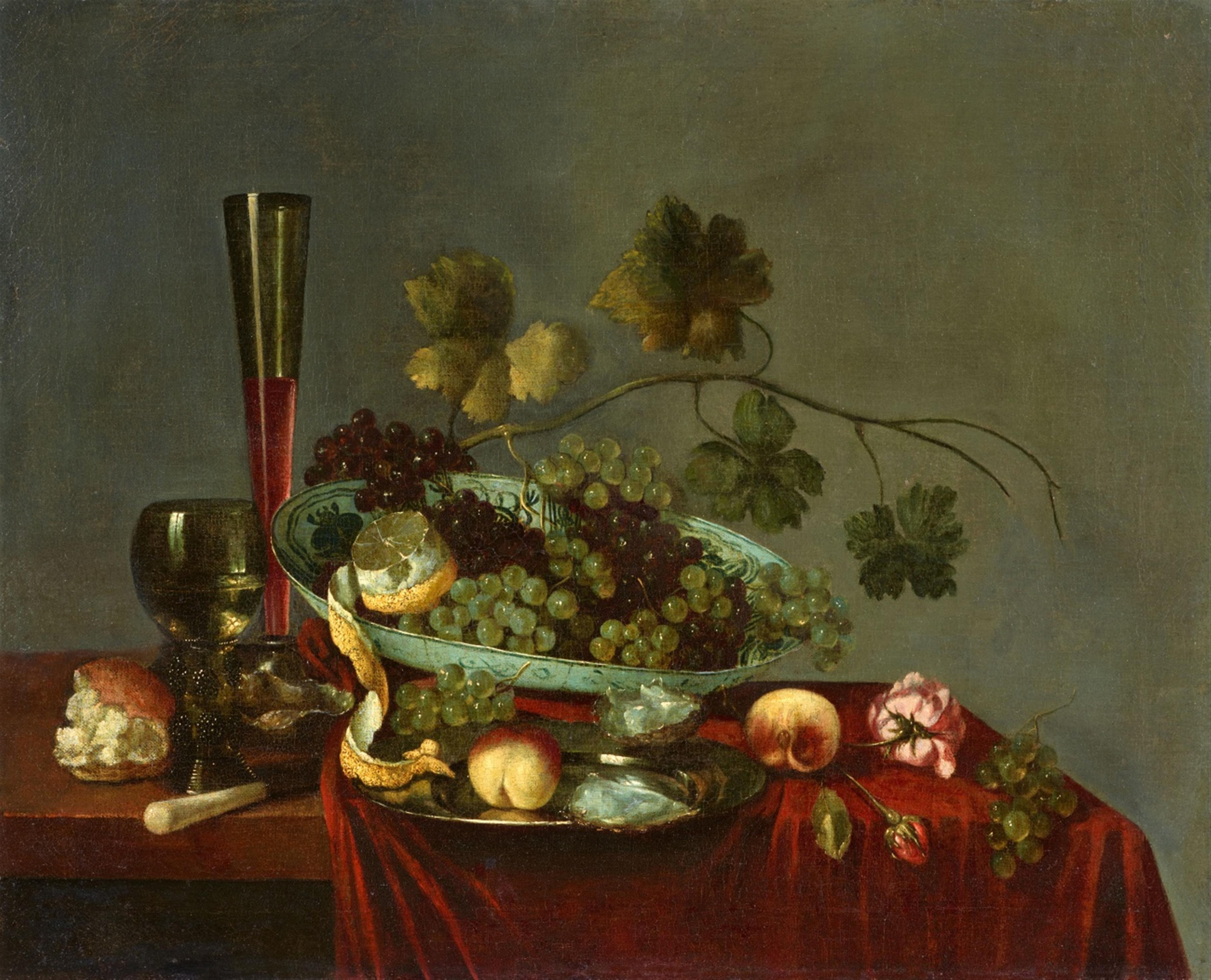 Abraham Susenier - Fruit Still Life with Grapes, Peaches, Flowers, a Lemon and an Oyster - image-1
