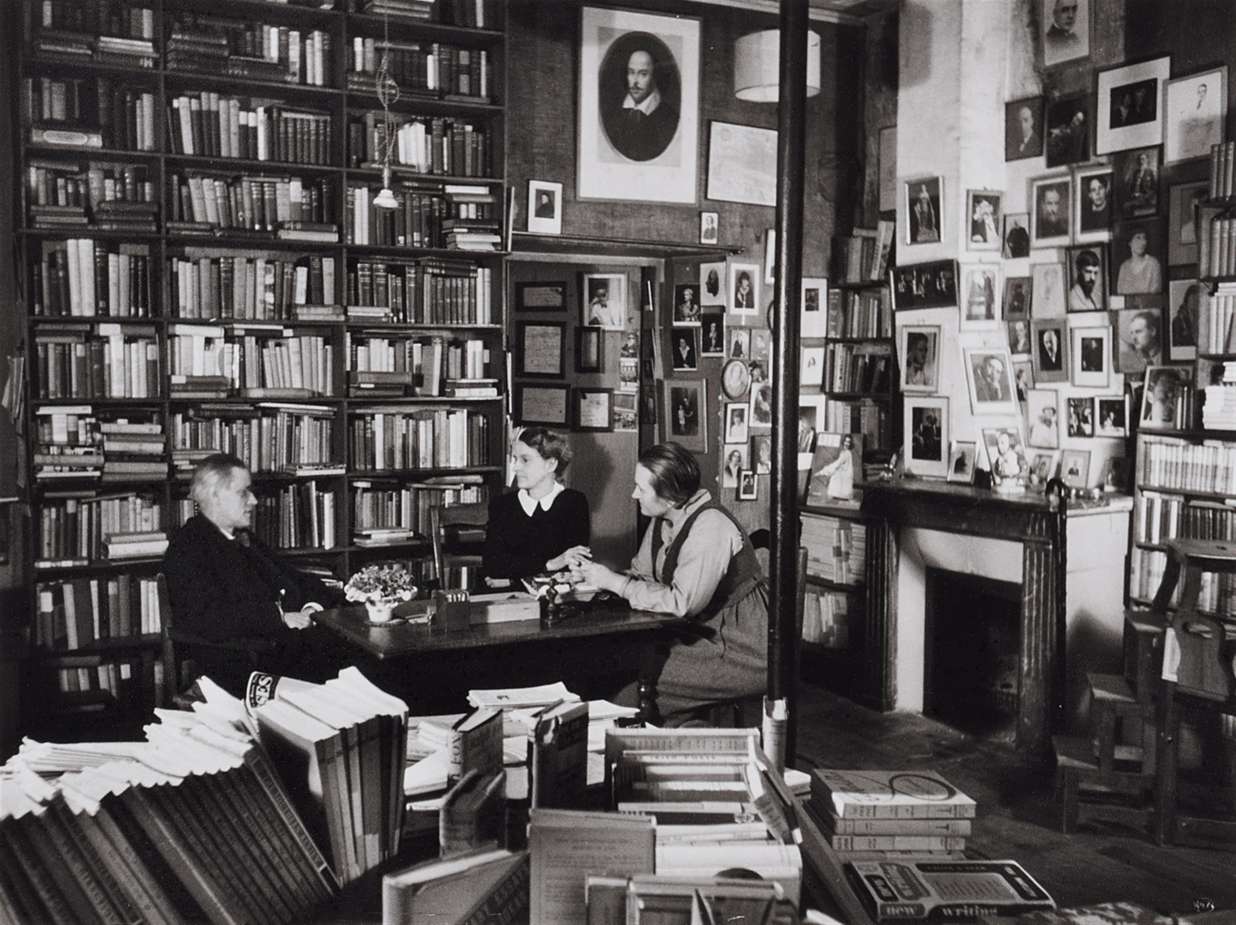 Gisèle Freund - James Joyce with Sylvia Beach and Adrienne Monnier in the bookshop "Shakespeare & Co", rue de l'Odéon - image-1