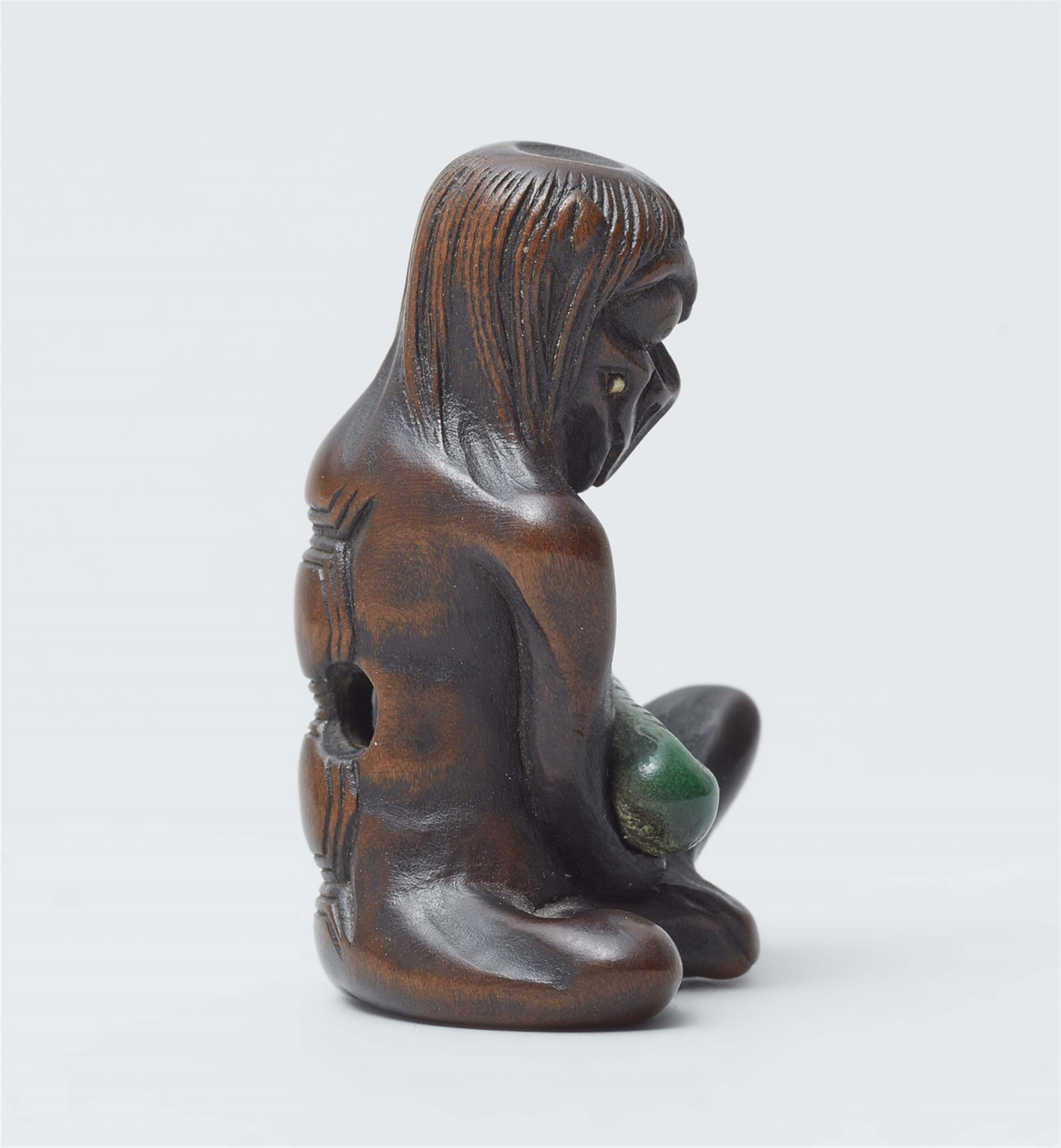 A wood and ivory netsuke of a kappa with a cucumber. 19th century - image-2