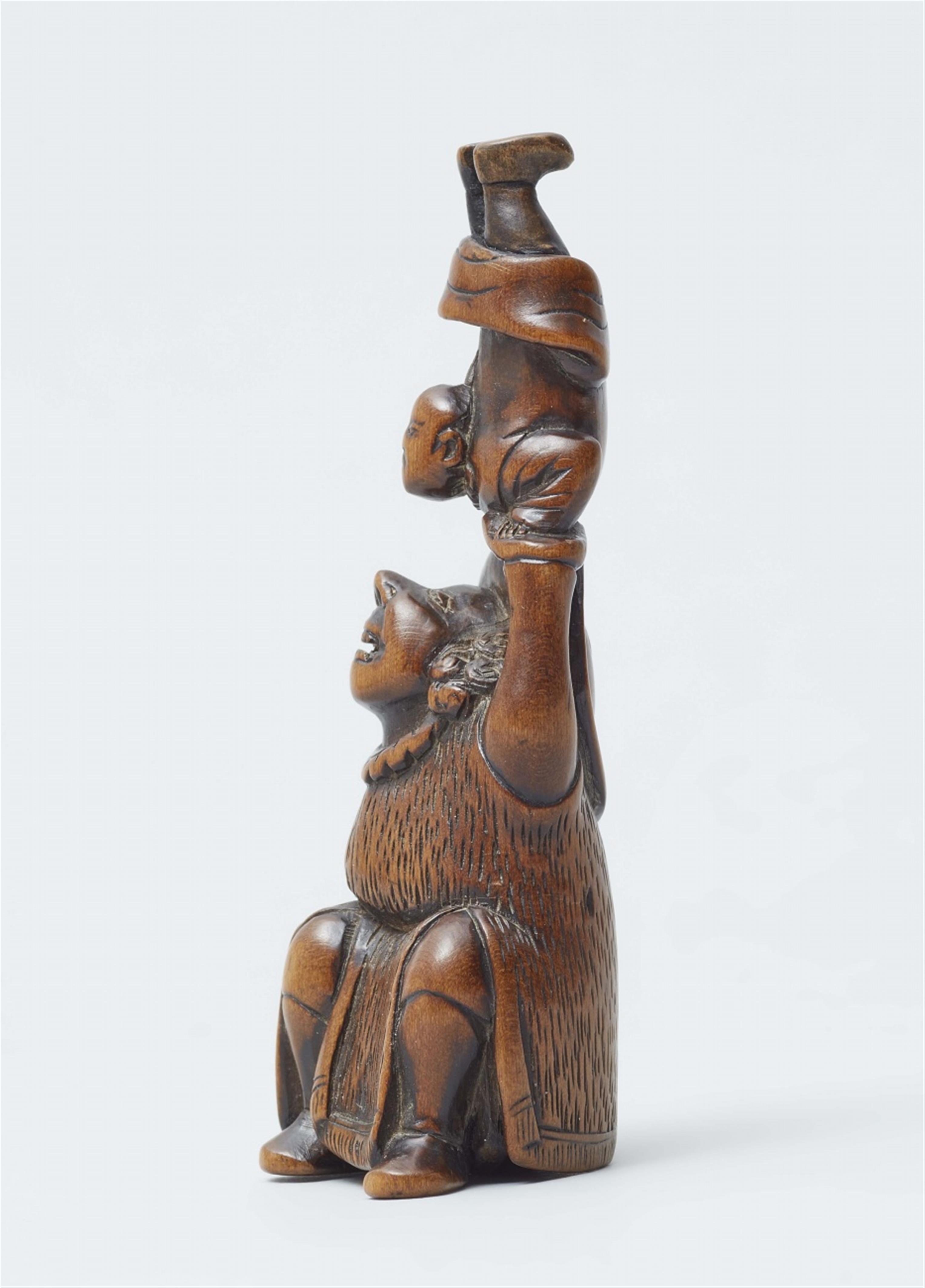 A rare boxwood netsuke of a Dutchman with an acrobat. Late 18th century - image-4
