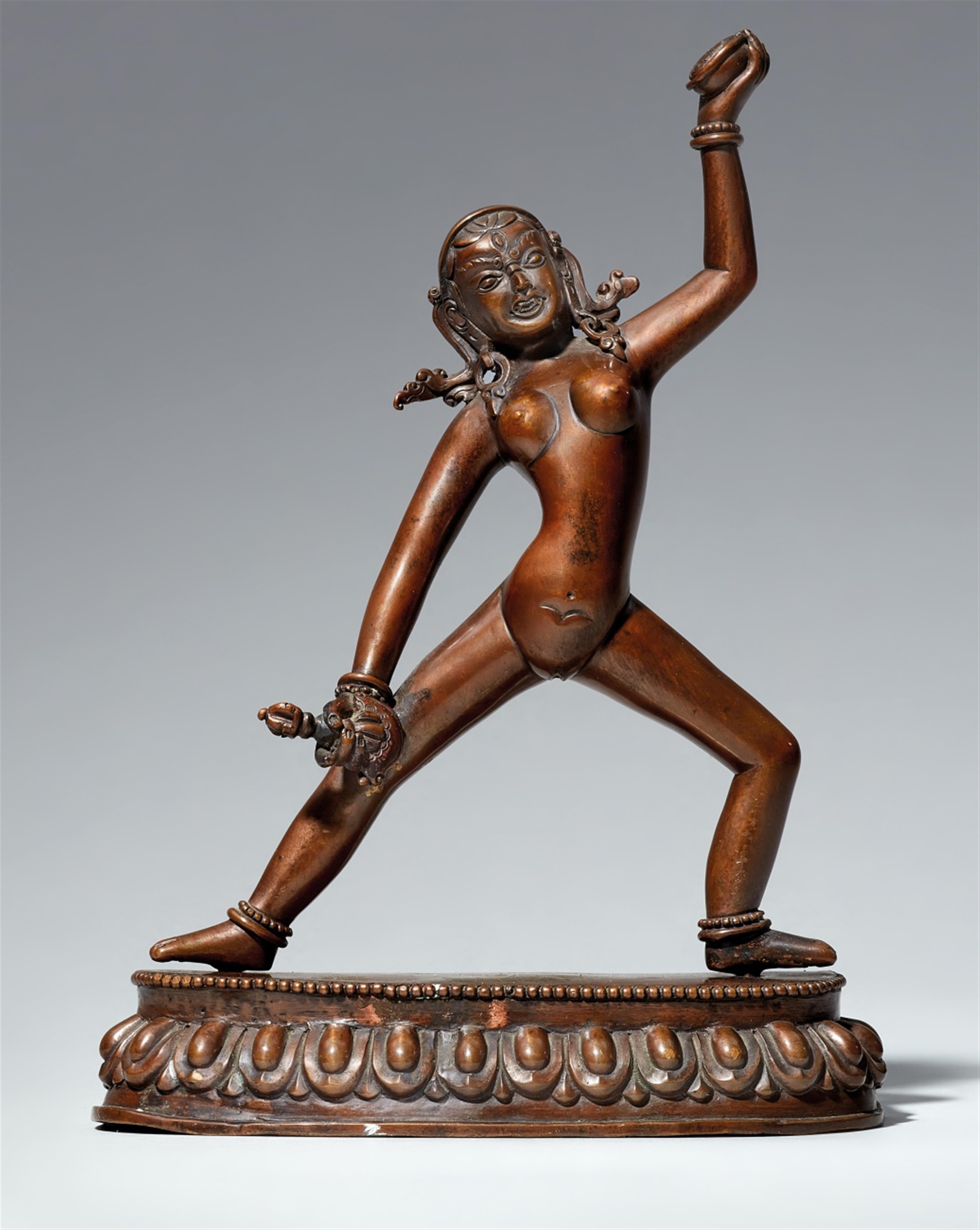 A Tibetan or Nepalese bronze figure of a Dakini. 19th century - image-1