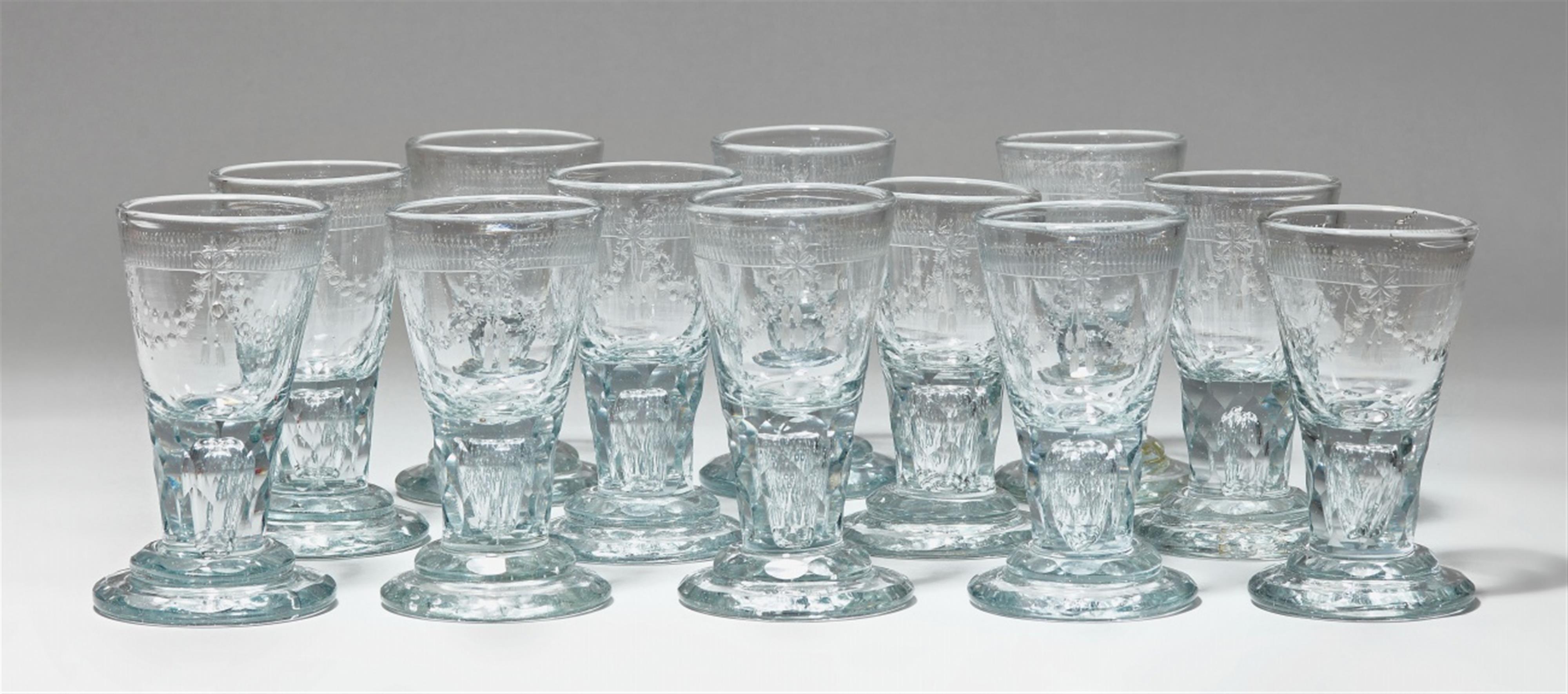 A set of 12 cut glass liqueur glasses - image-1