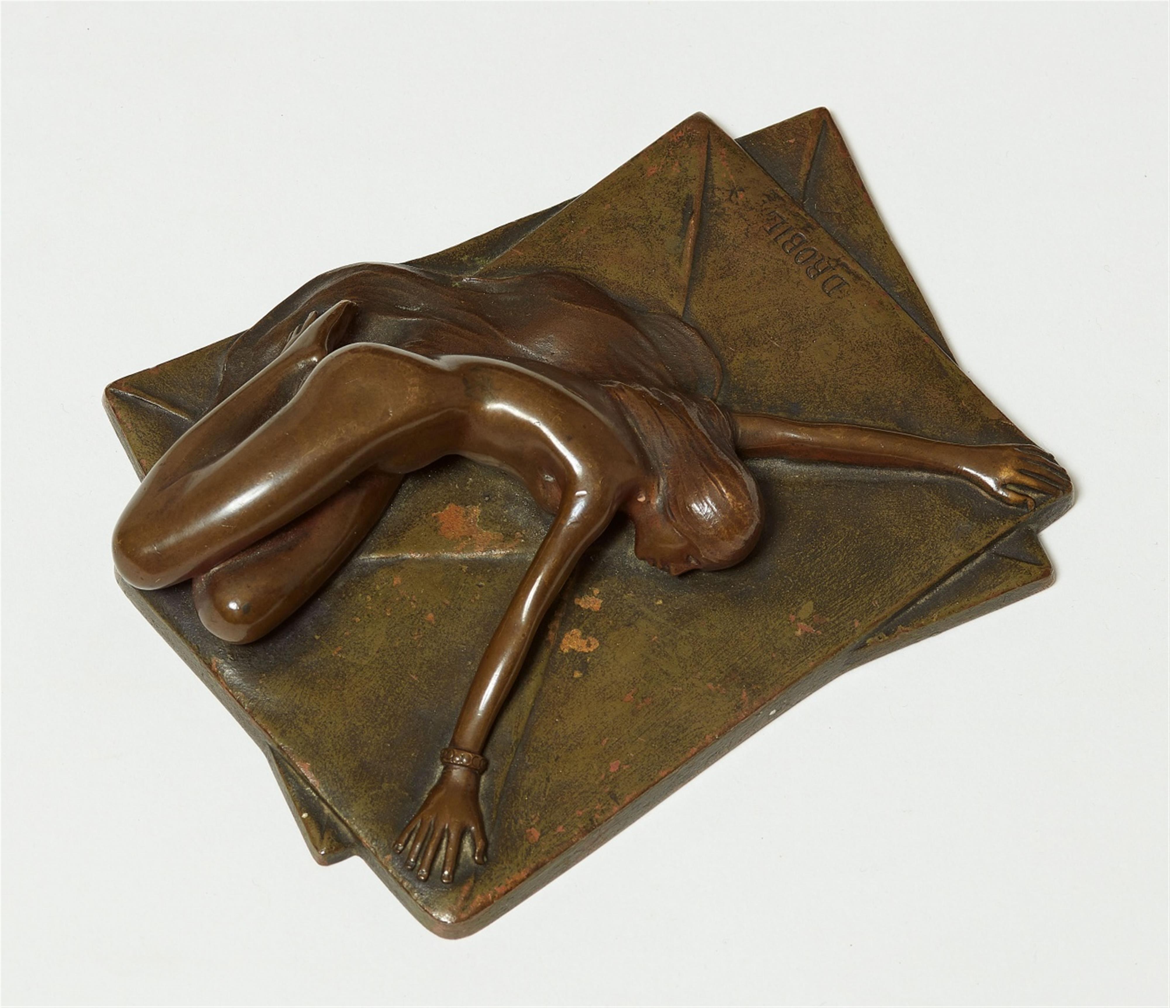 A bronze paperweight - image-1