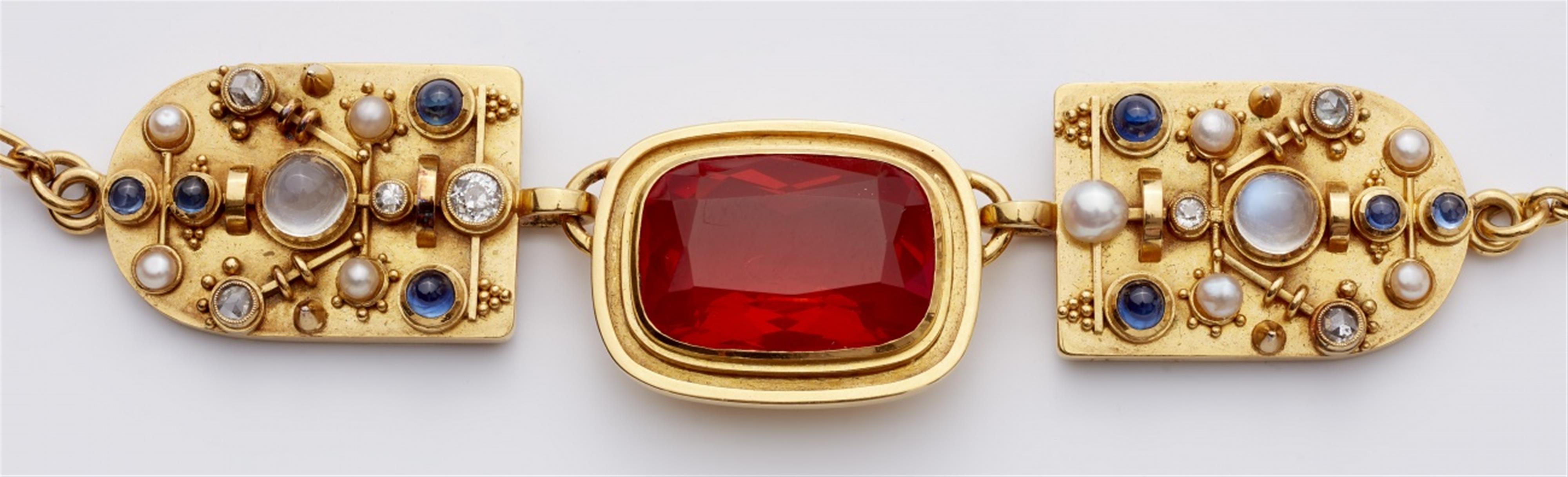 A 14k gold gemstone necklace - image-2