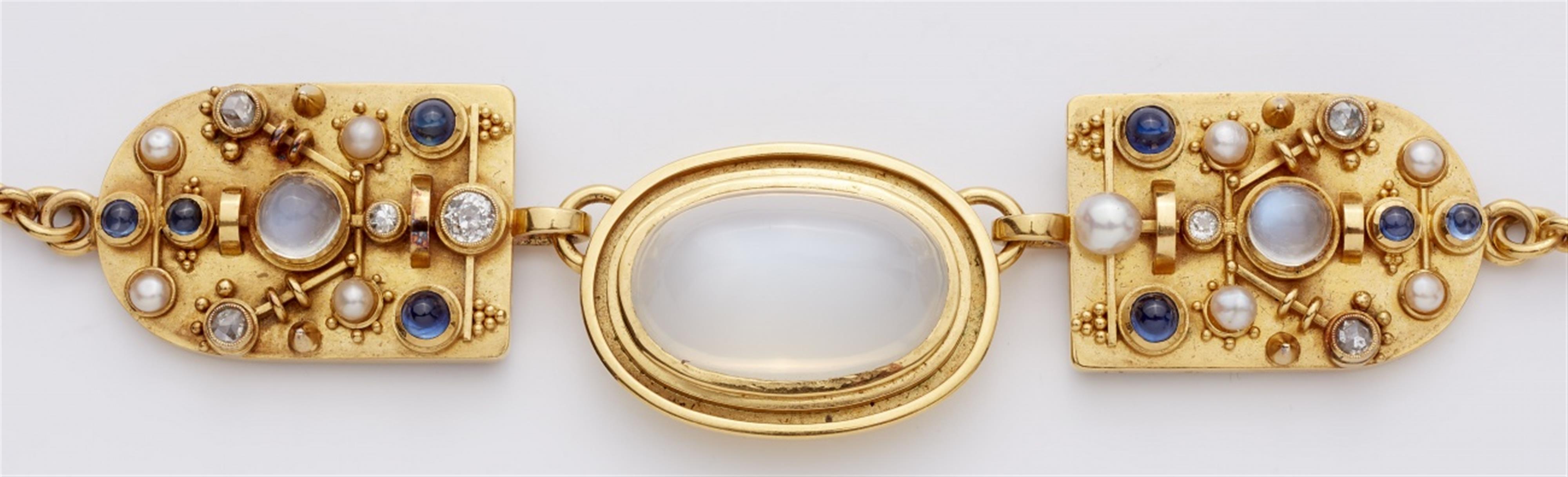 A 14k gold gemstone necklace - image-3