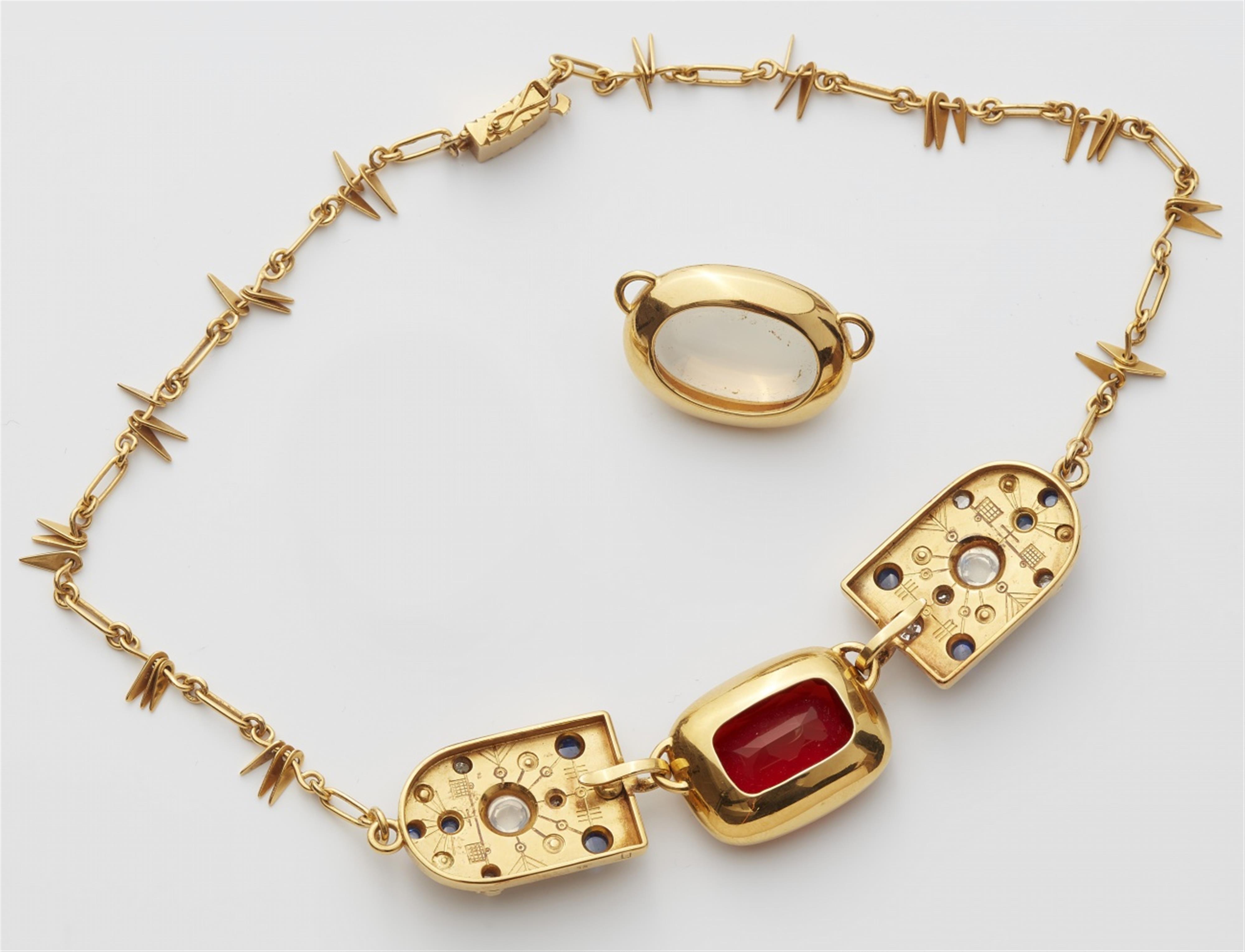 A 14k gold gemstone necklace - image-4