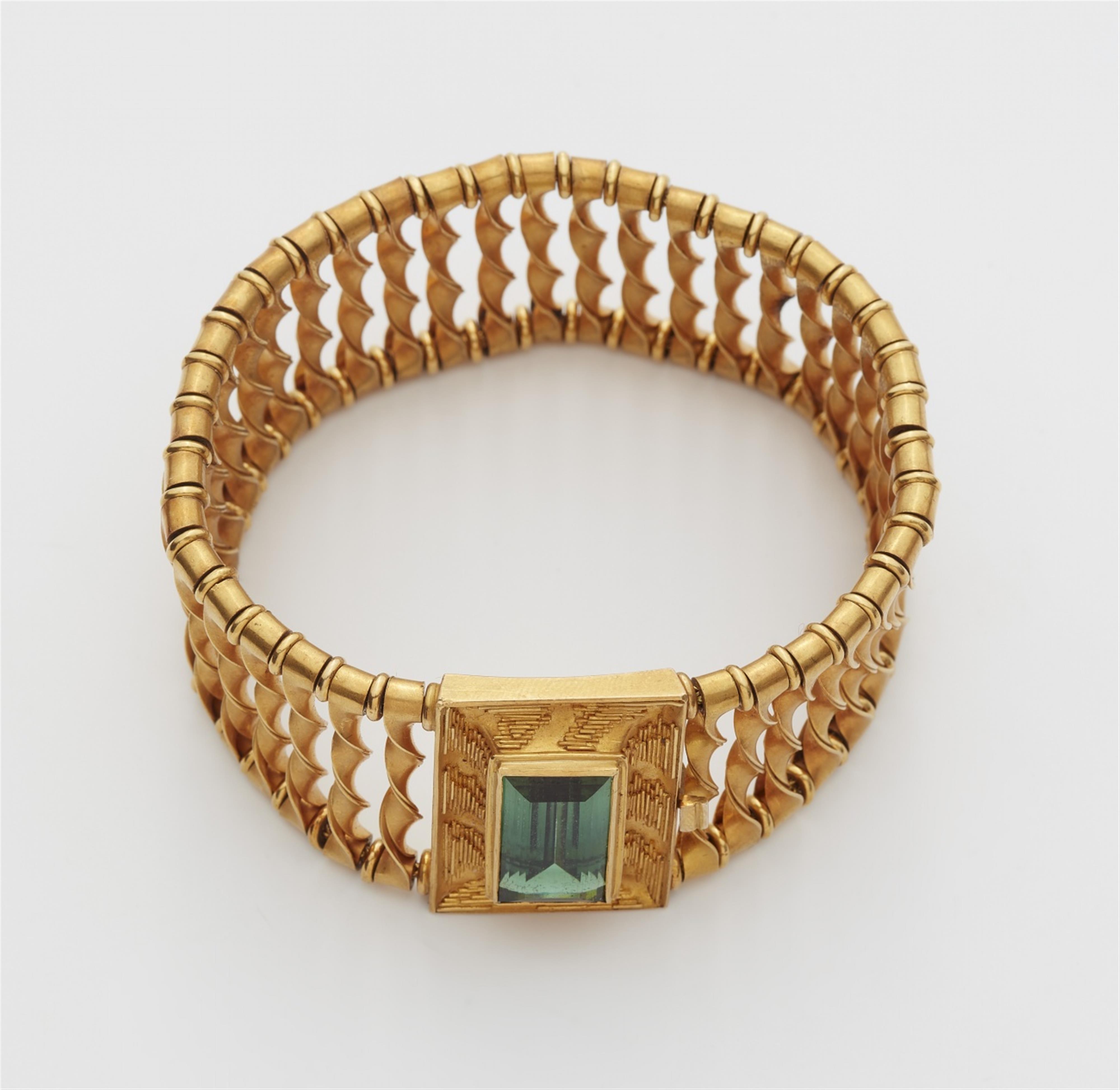 An 18k gold and green tourmaline bracelet - image-2