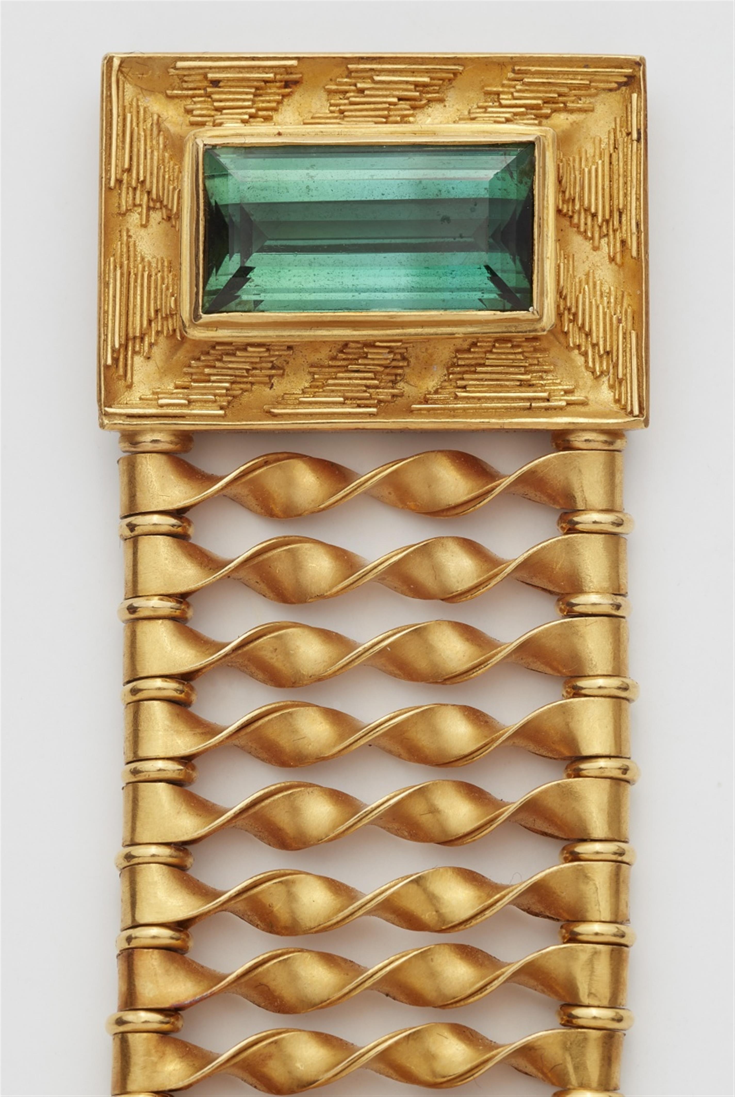 An 18k gold and green tourmaline bracelet - image-4