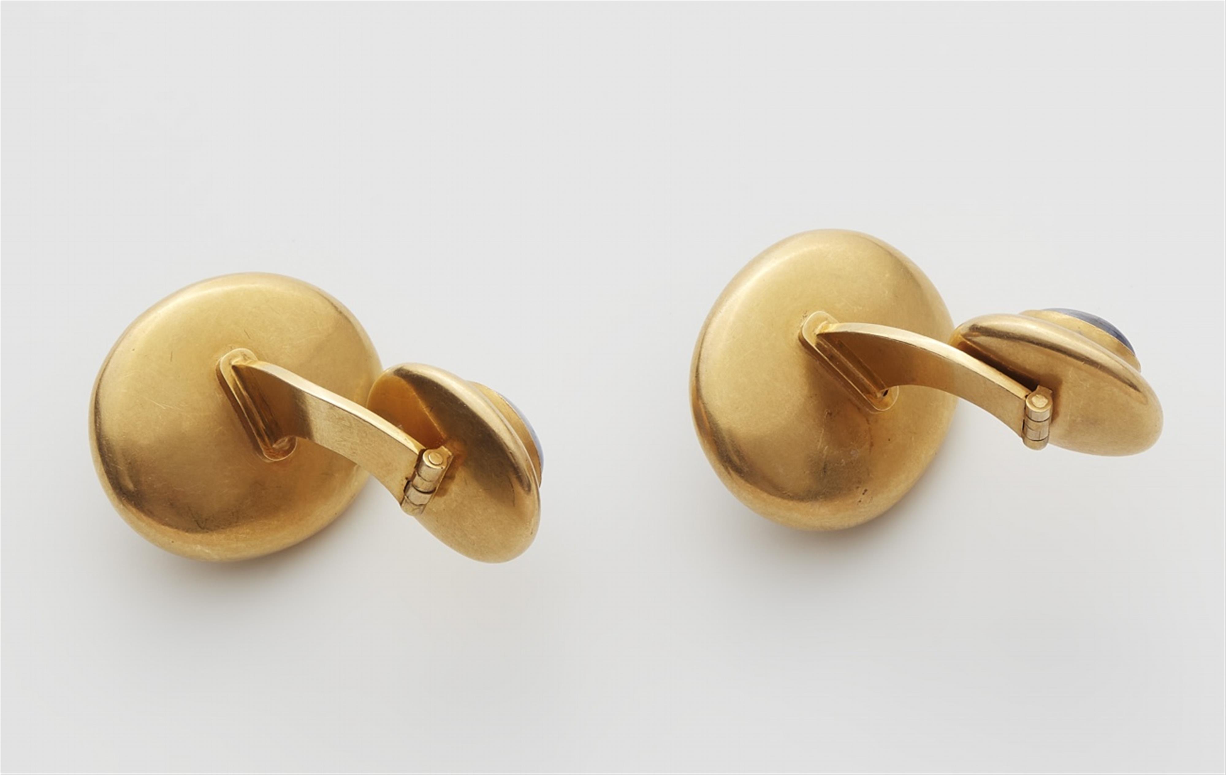 A pair of 18k gold sapphire cufflinks - image-2