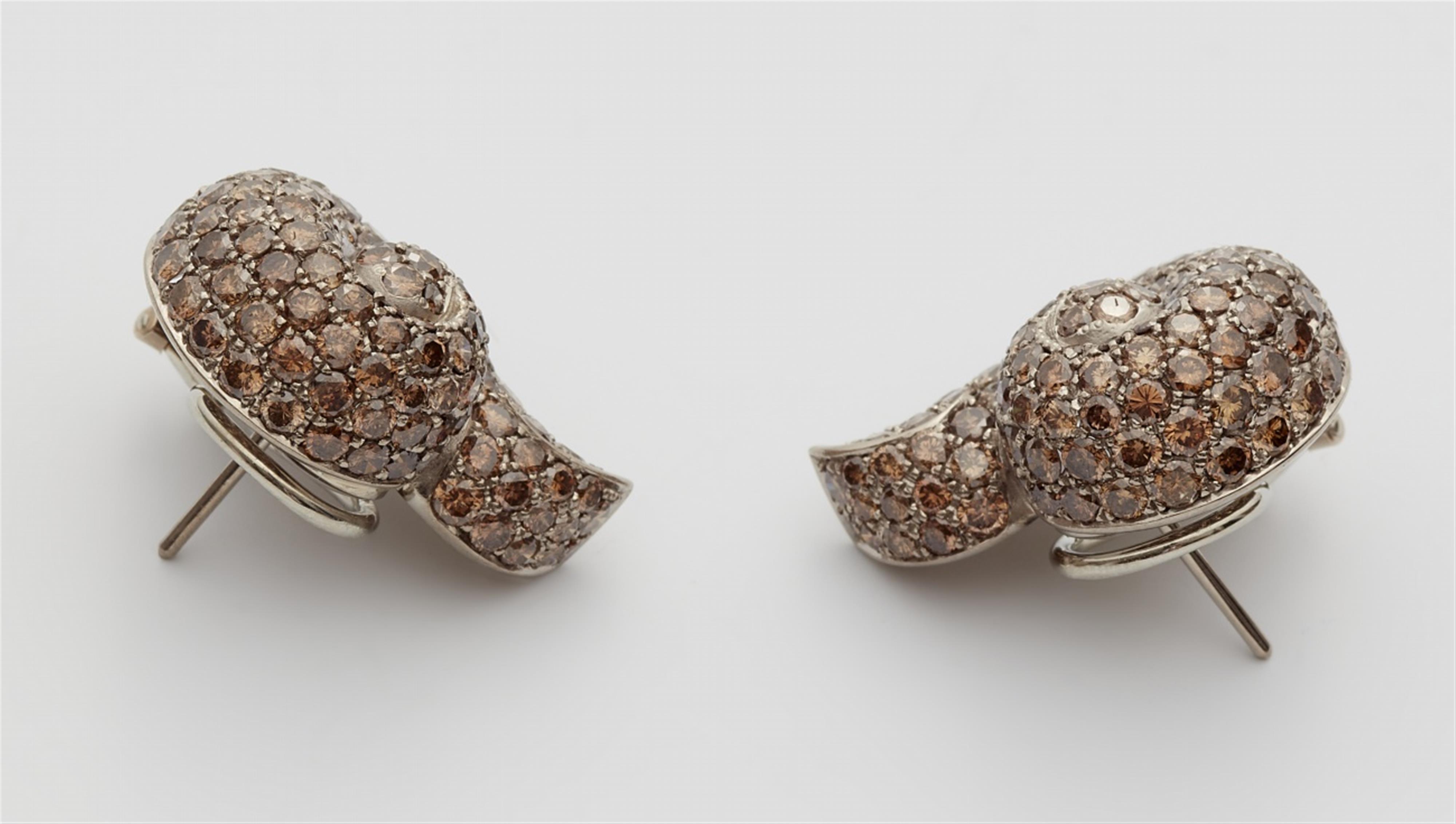 A pair of 18k white gold and natural brown fancy diamond clip earrings - image-2