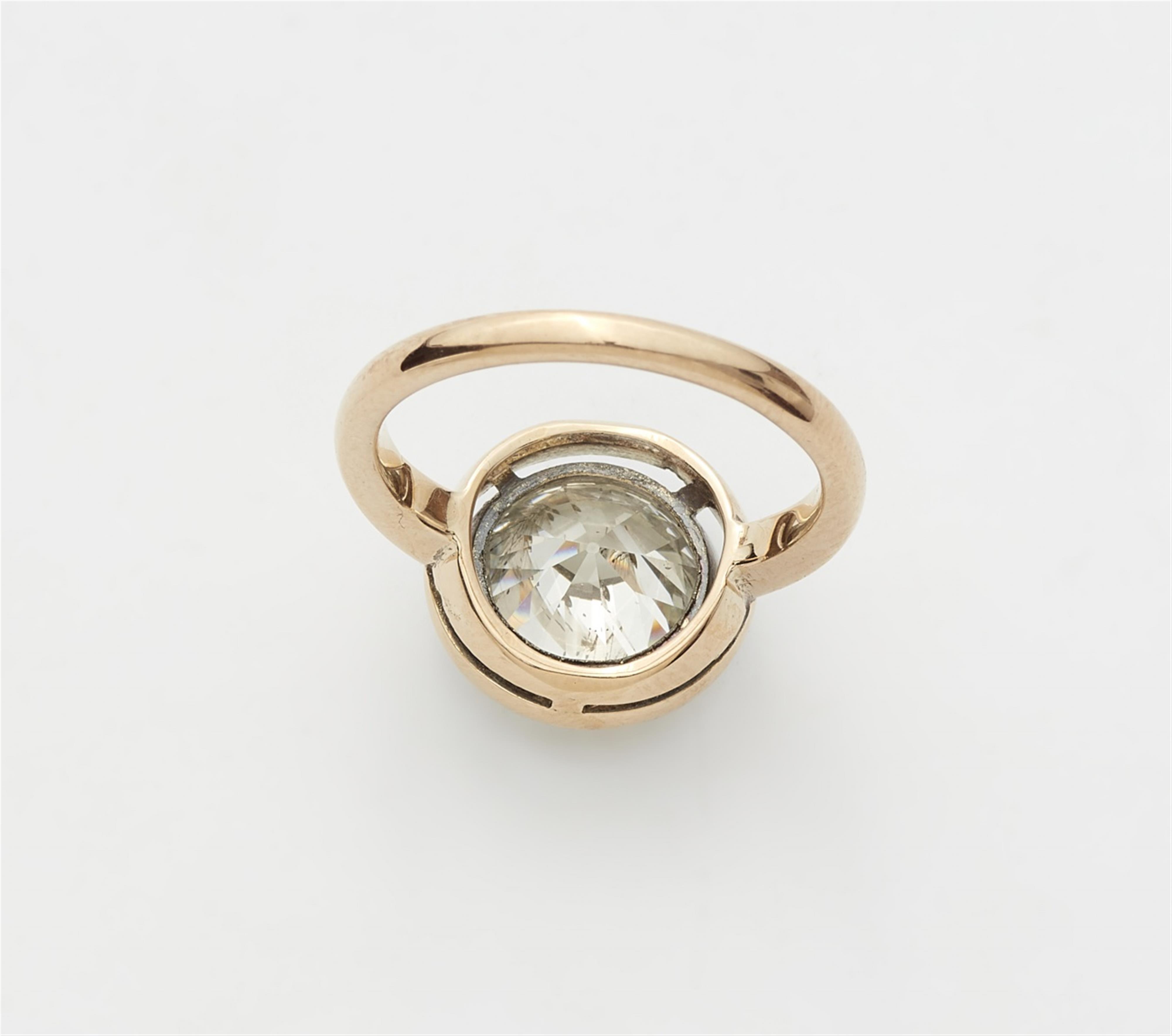 A 14k gold and platinum solitaire ring with a European old-cut diamond - image-2