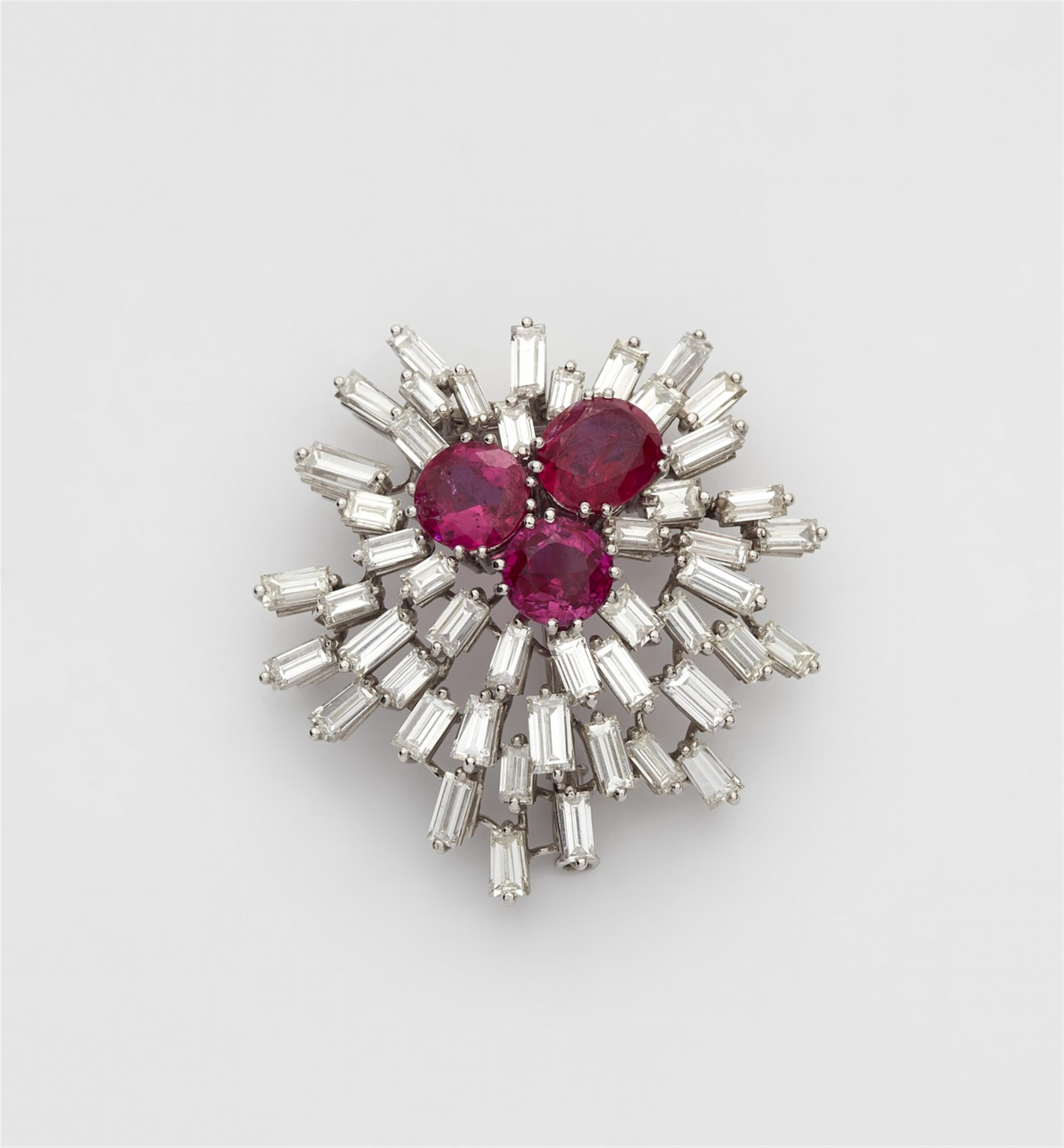 A platinum and diamond clip brooch with three natural Burmese rubies - image-1