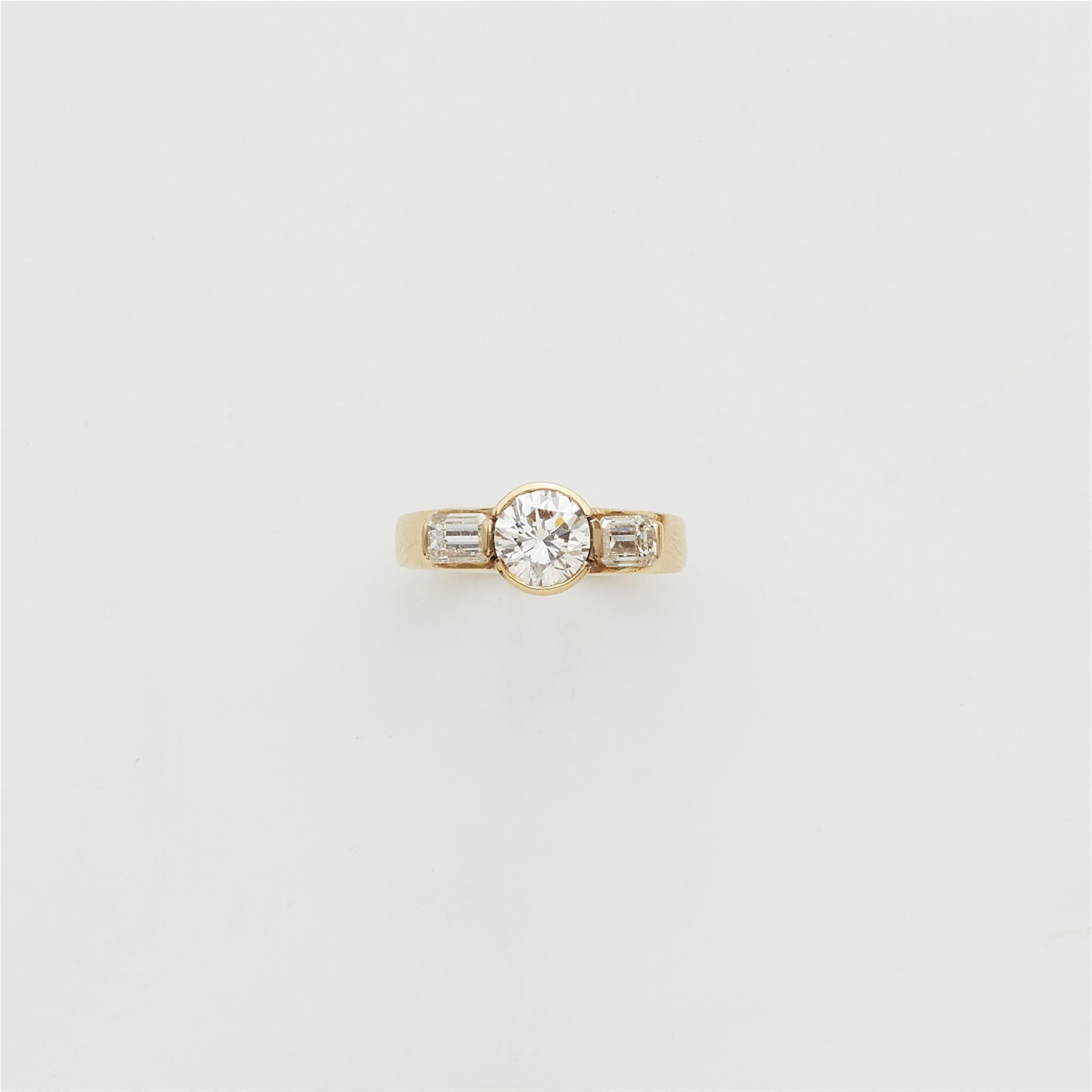 An 18k gold diamond trinity ring - image-1