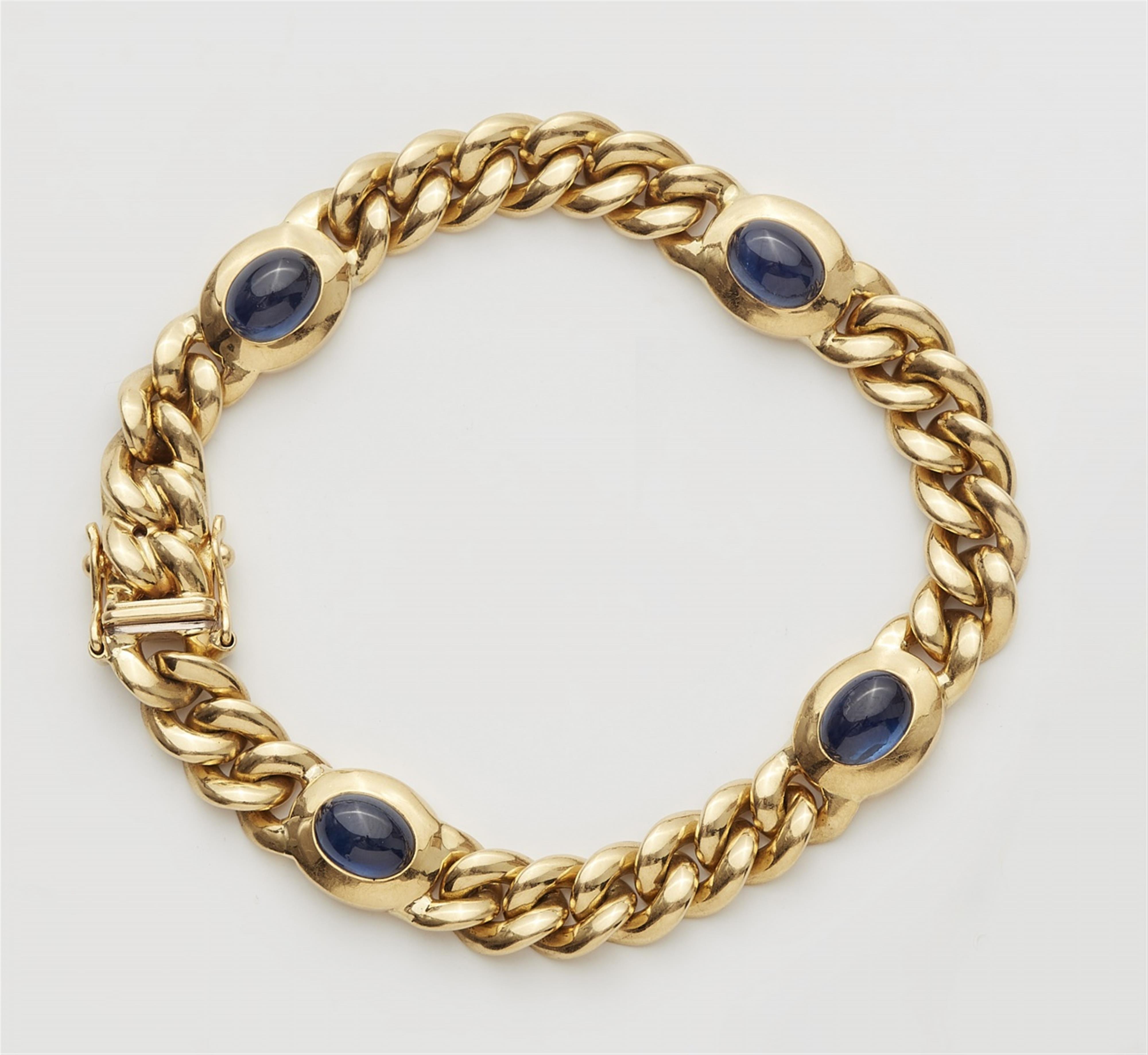 An 18k gold chain bracelet with sapphires - image-1
