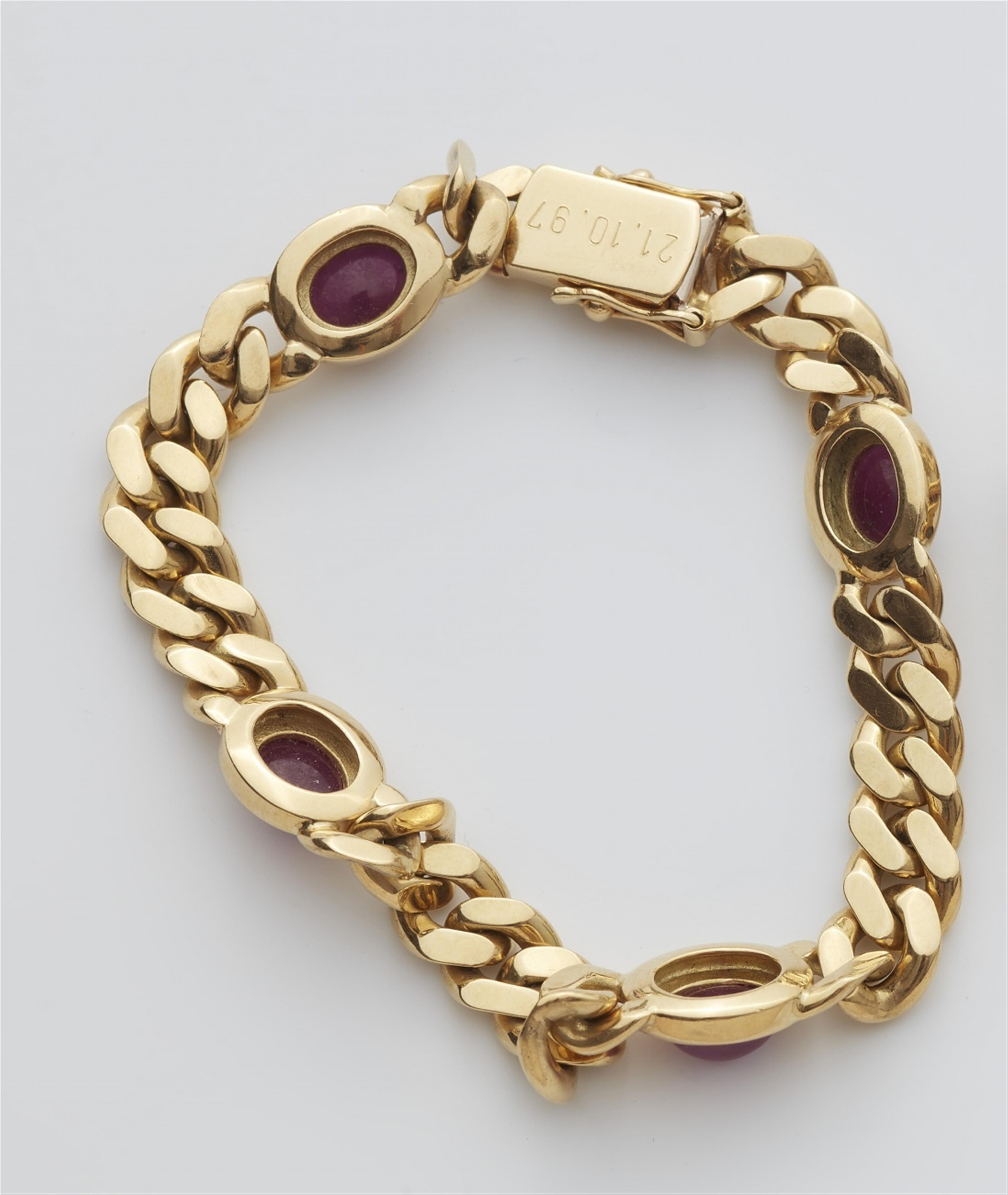 An 18k gold chain bracelet with rubies - image-2