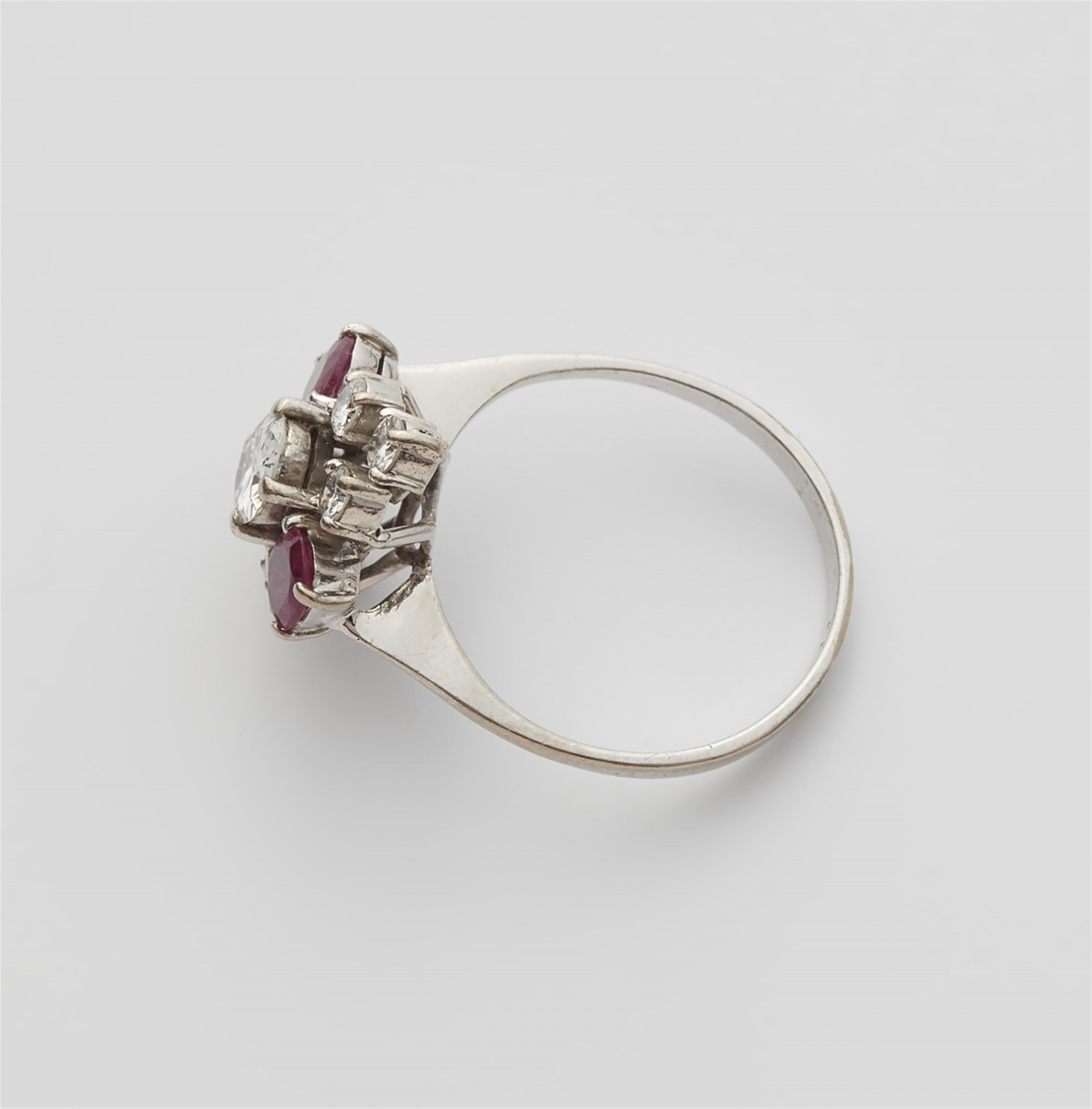 A 14k white gold diamond and ruby ring - image-2