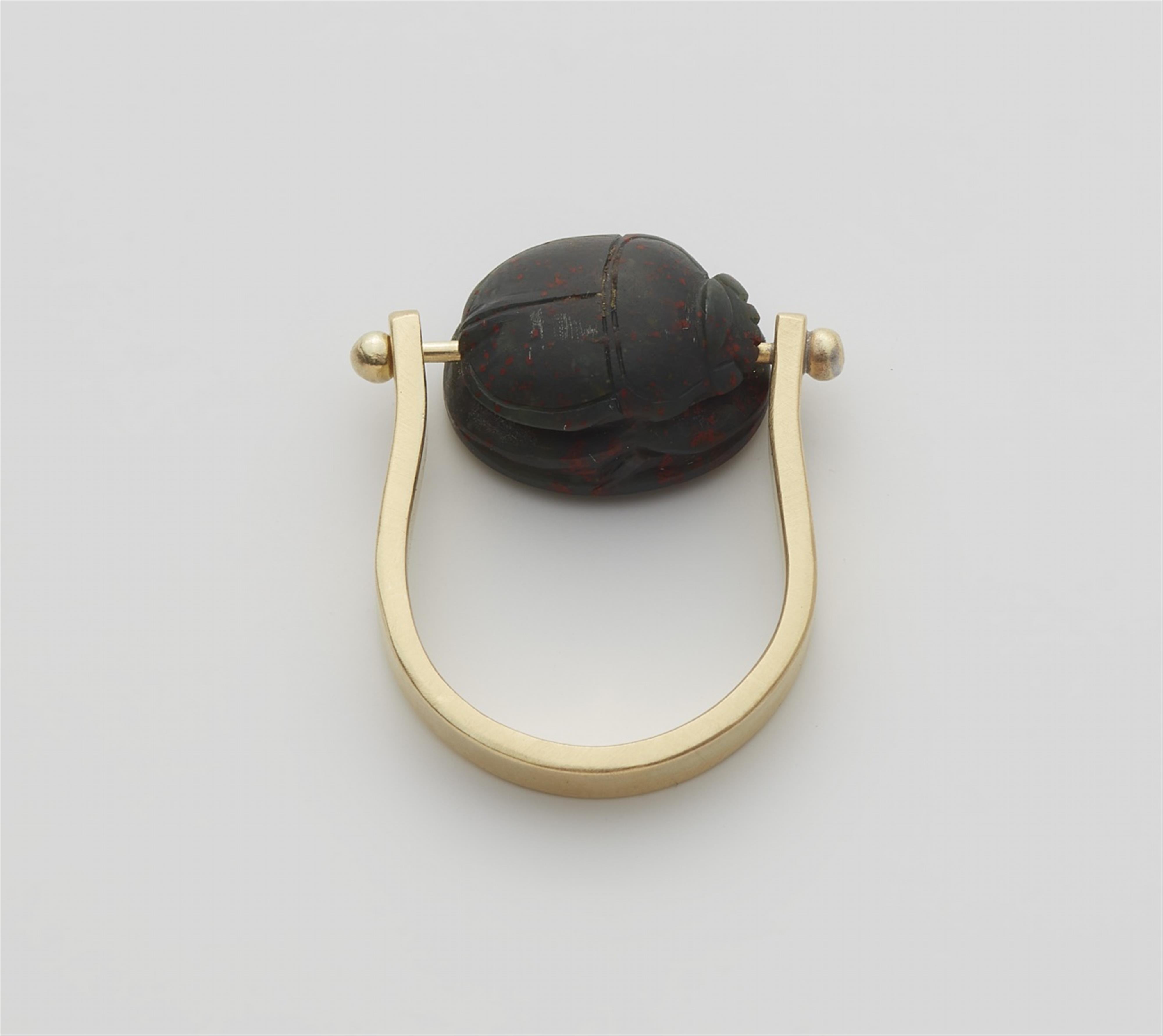 A 14k gold twisting ring with an ancient Phoenician scarab amulet. - image-2