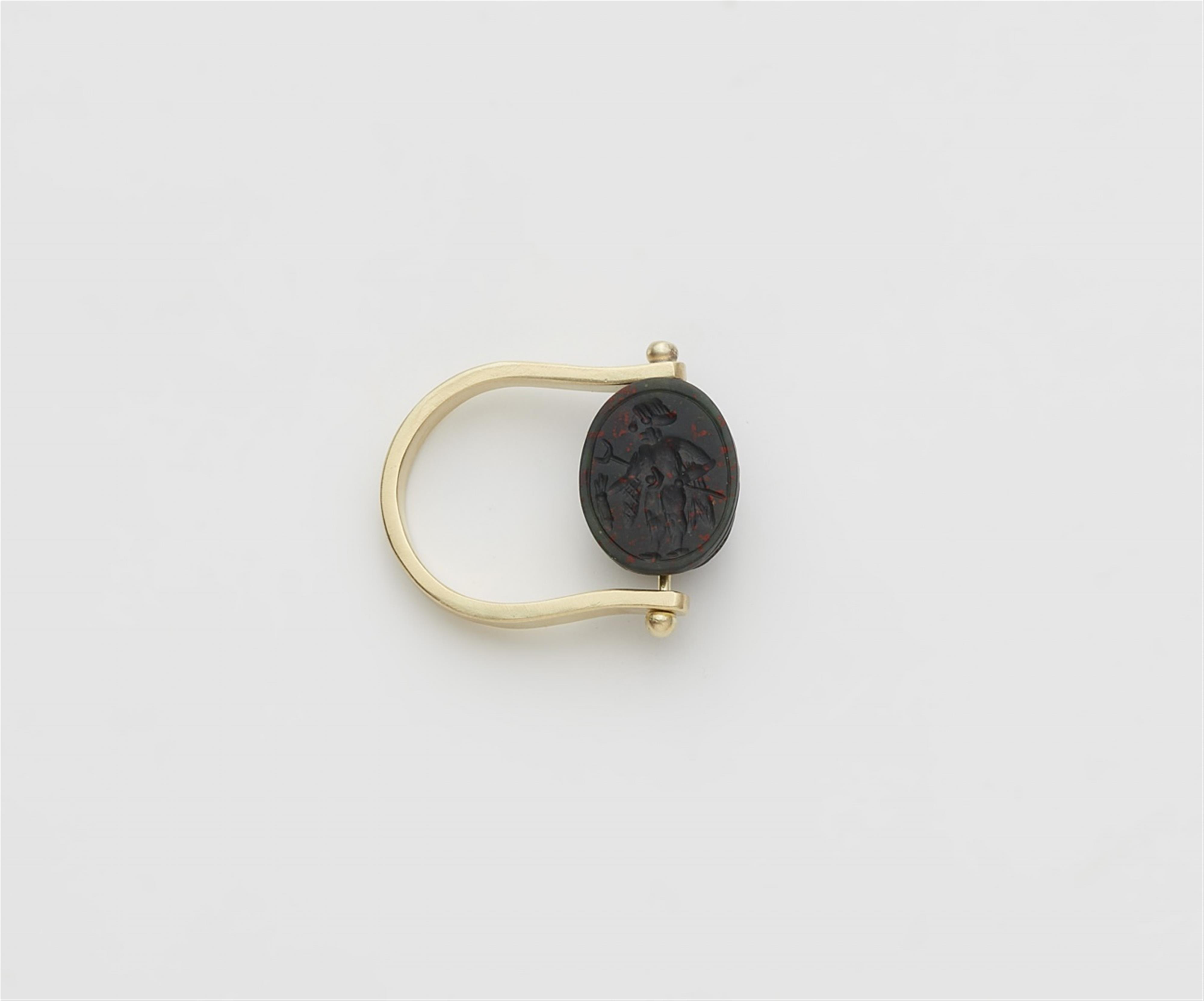 A 14k gold twisting ring with an ancient Phoenician scarab amulet. - image-1