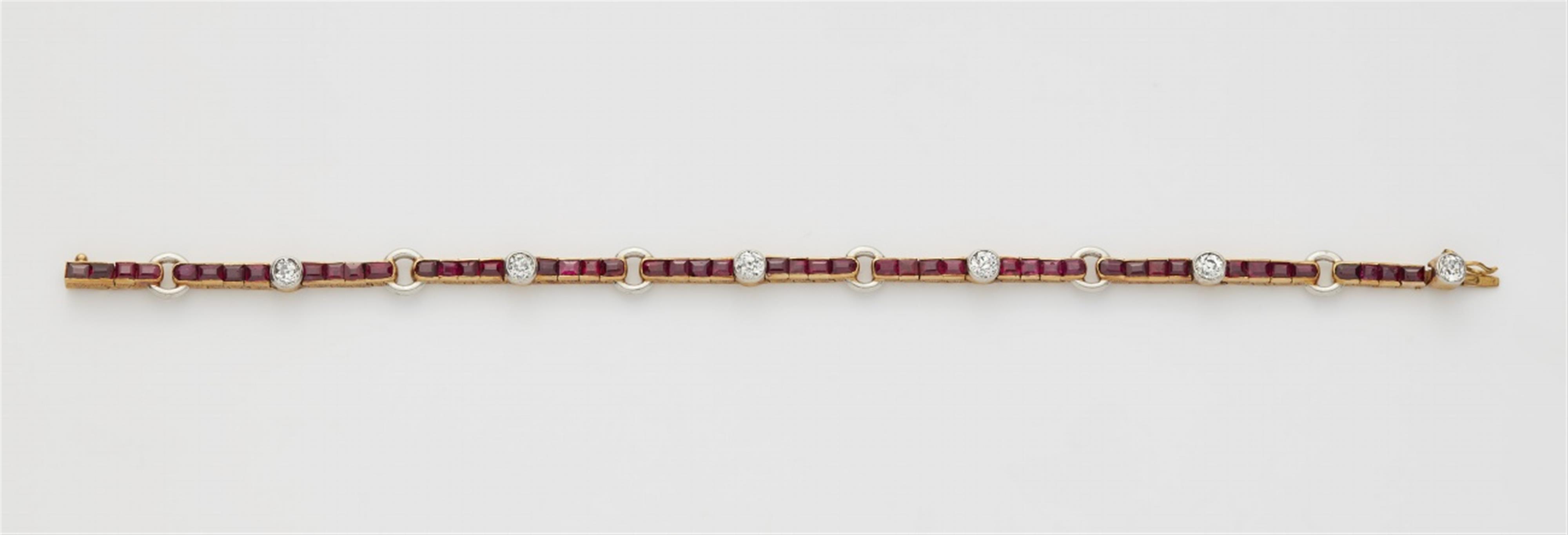 An 18k gold ruby and diamond rivière bracelet - image-1