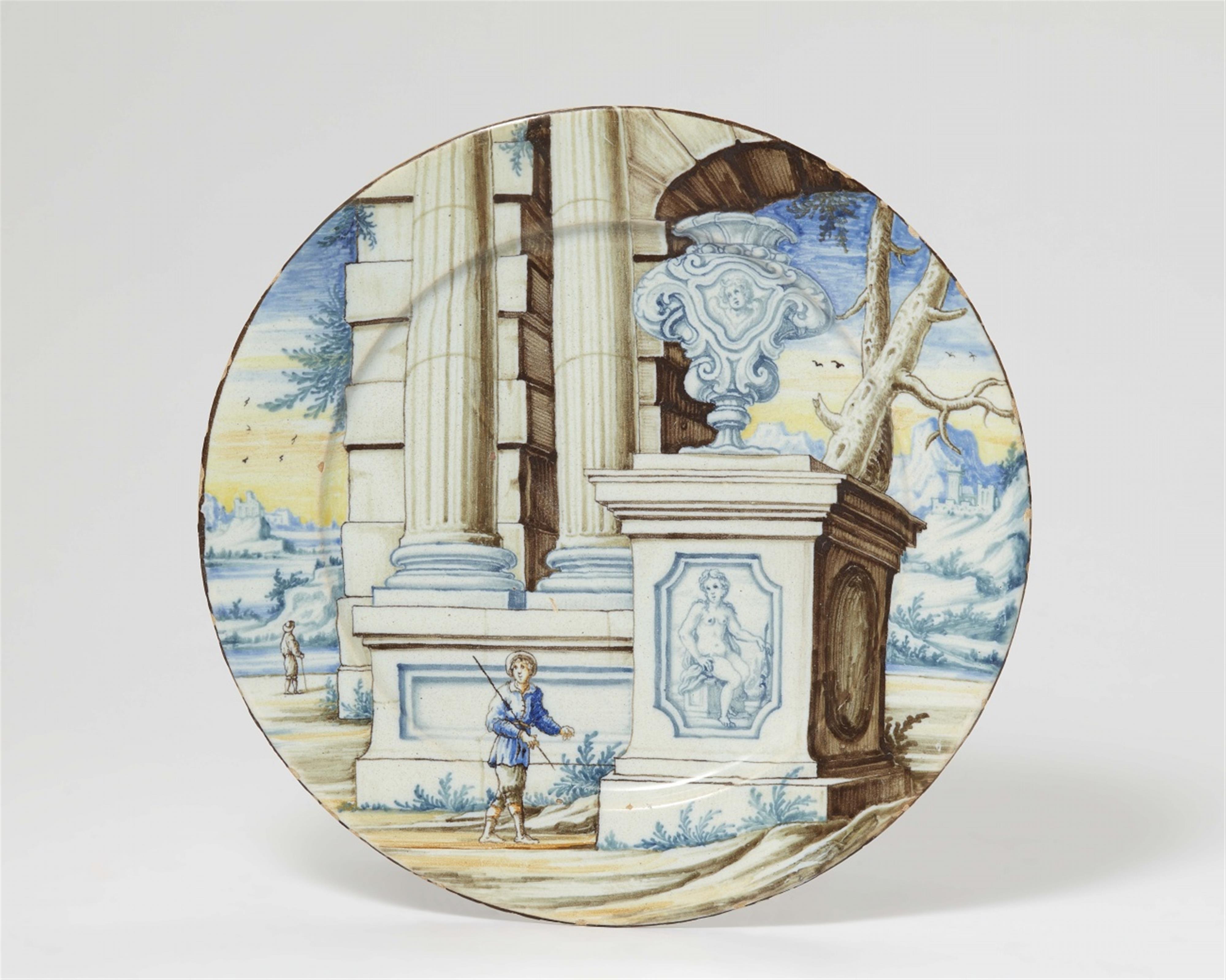An Italian majolica dish with ruins in a landscape - image-1