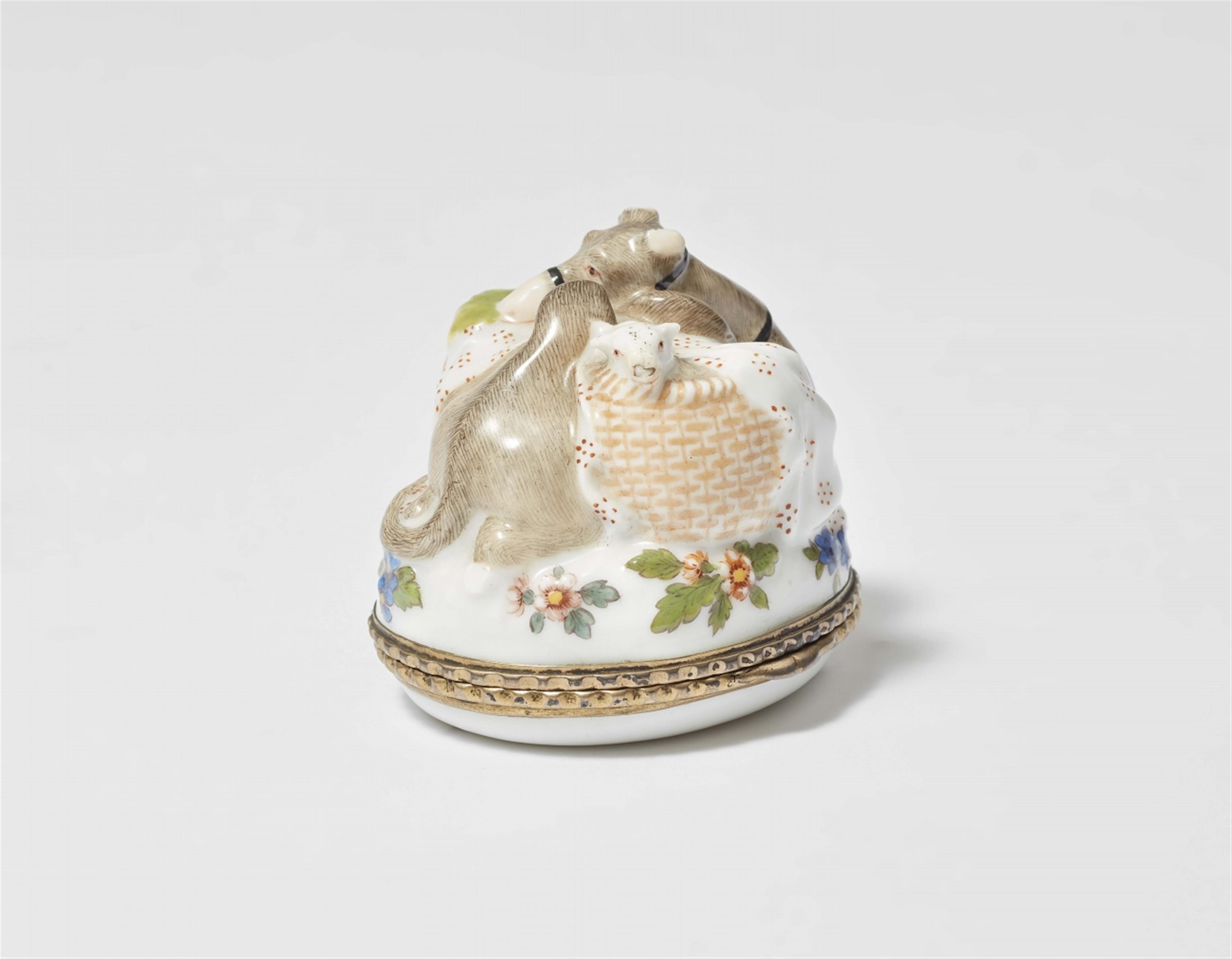 Porcelain model of a camel and two lambs in a basket as a snuff box - image-1