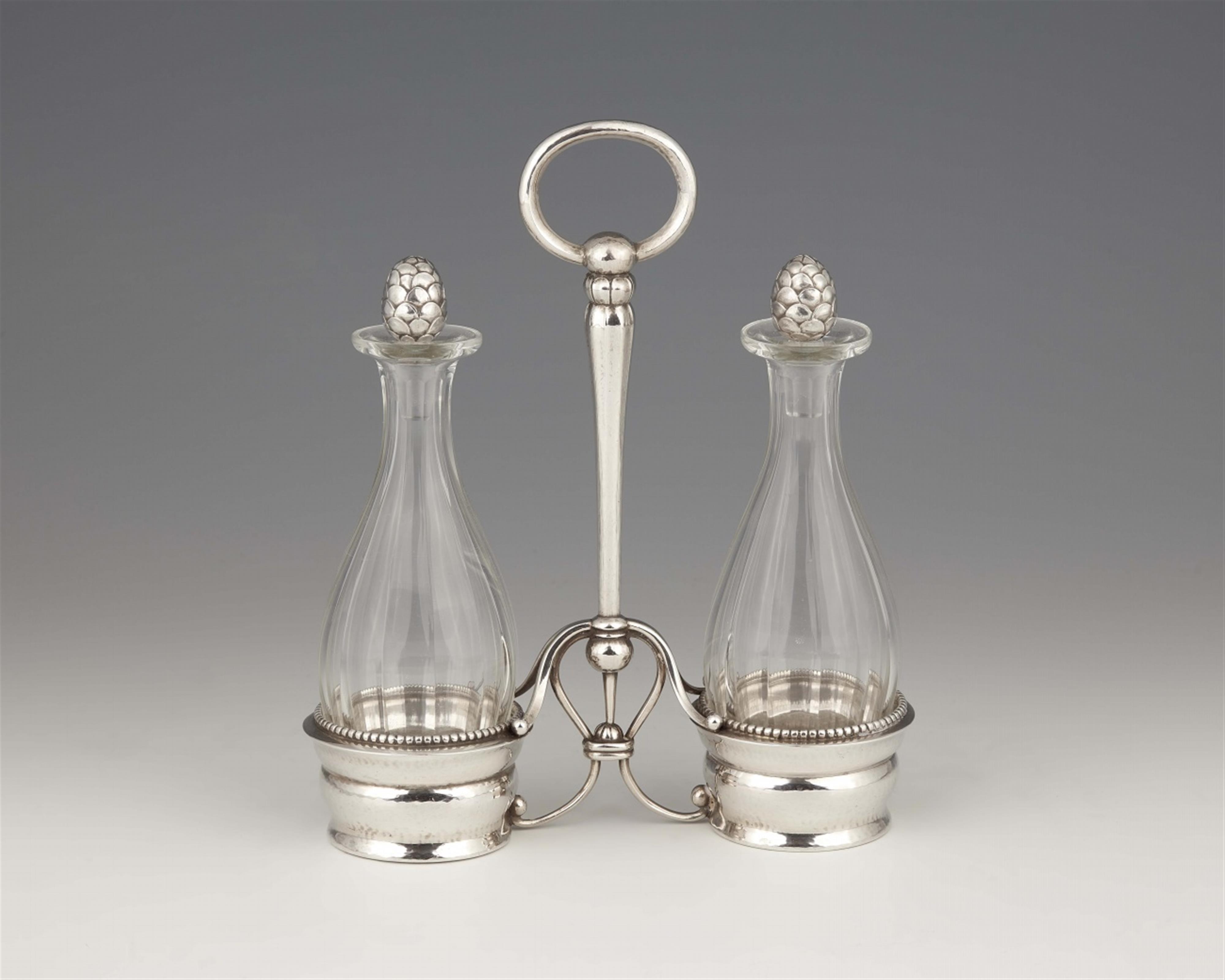 A Georg Jensen Copenhagen silver cruet set, model no. 134 - image-1