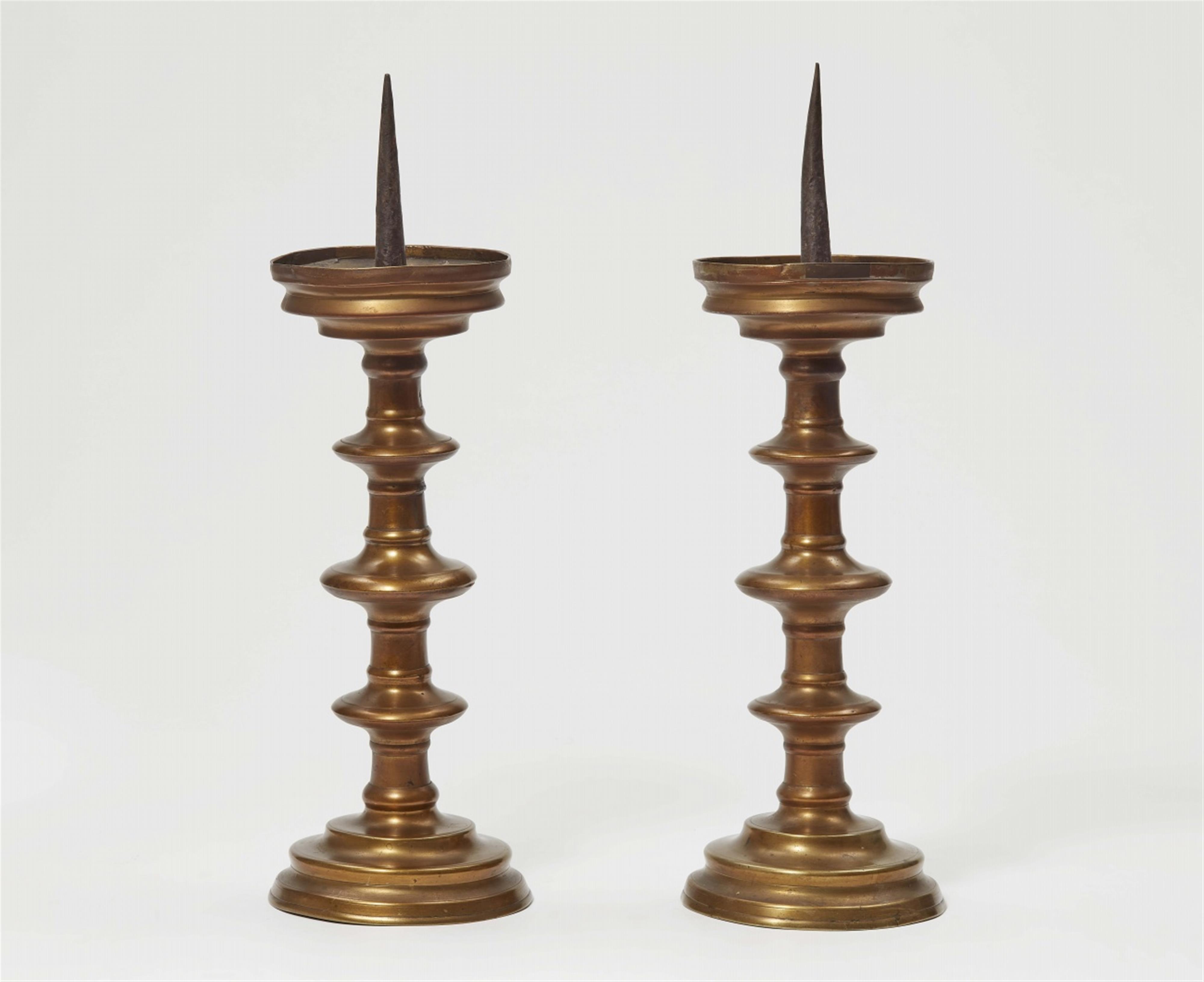 A pair of late Gothic brass candlesticks - image-1
